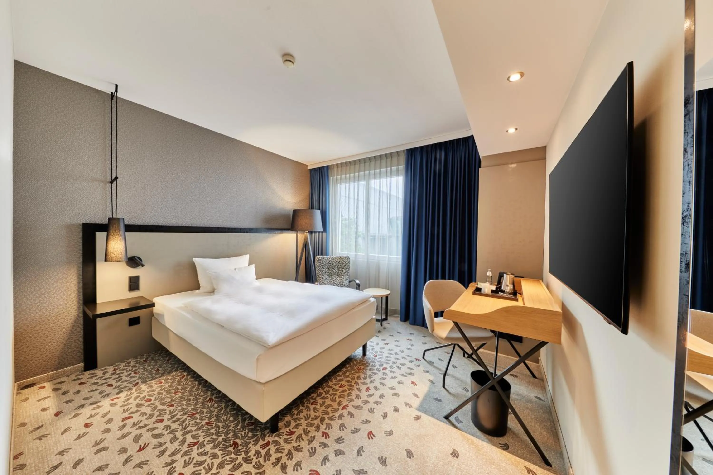 Bed in Steigenberger Hotel Bielefelder Hof