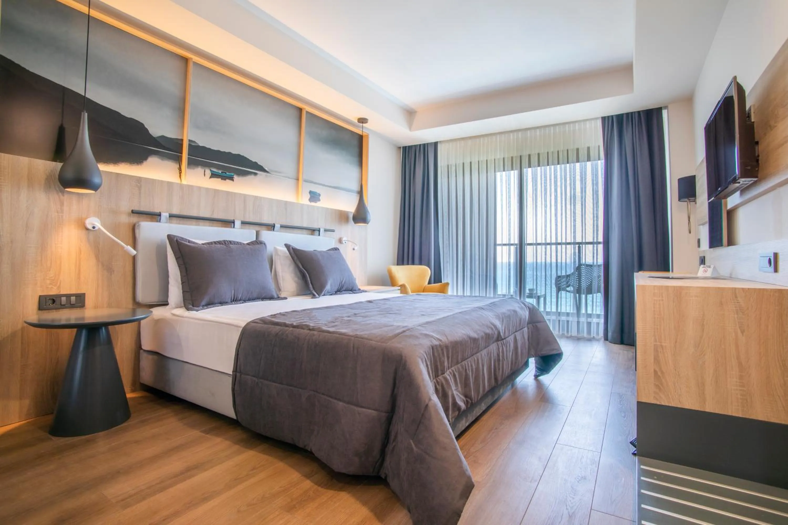 Bed in MAIA Luxury Beach Hotel & Spa