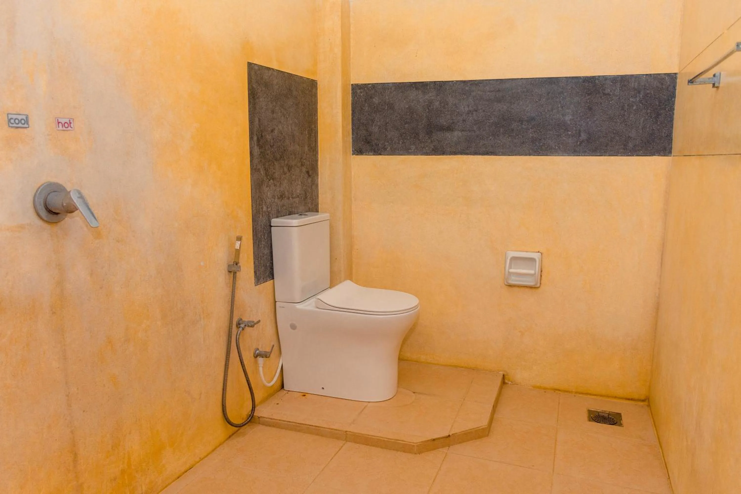 Toilet in Harmony Beach Resort