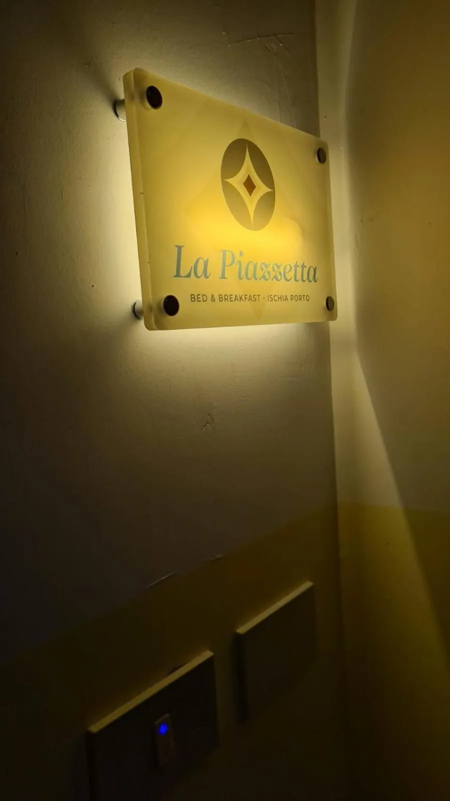 Property logo or sign in B&B La Piazzetta