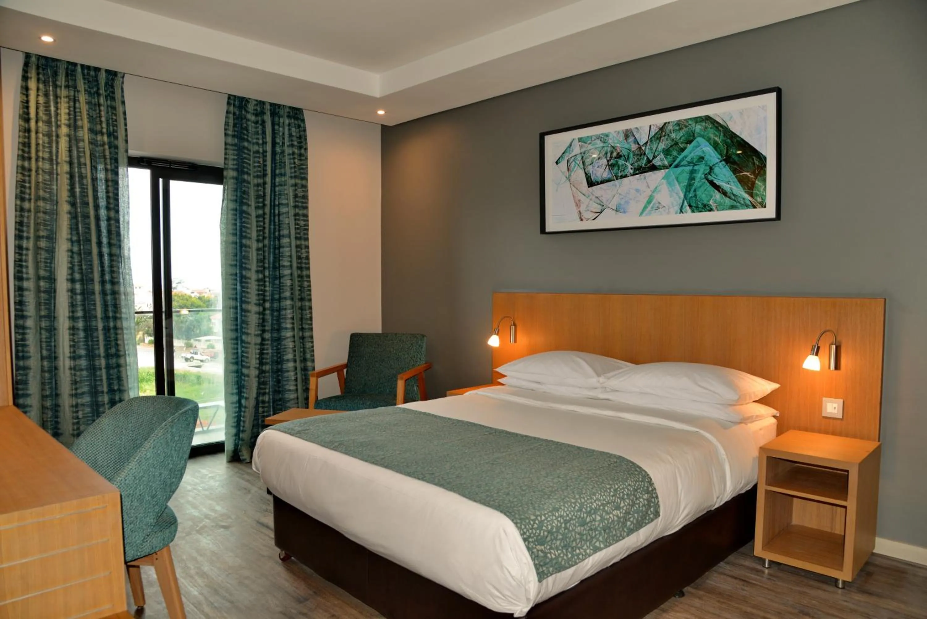 Photo of the whole room, Bed in City Lodge Hotel Maputo, Mozambique