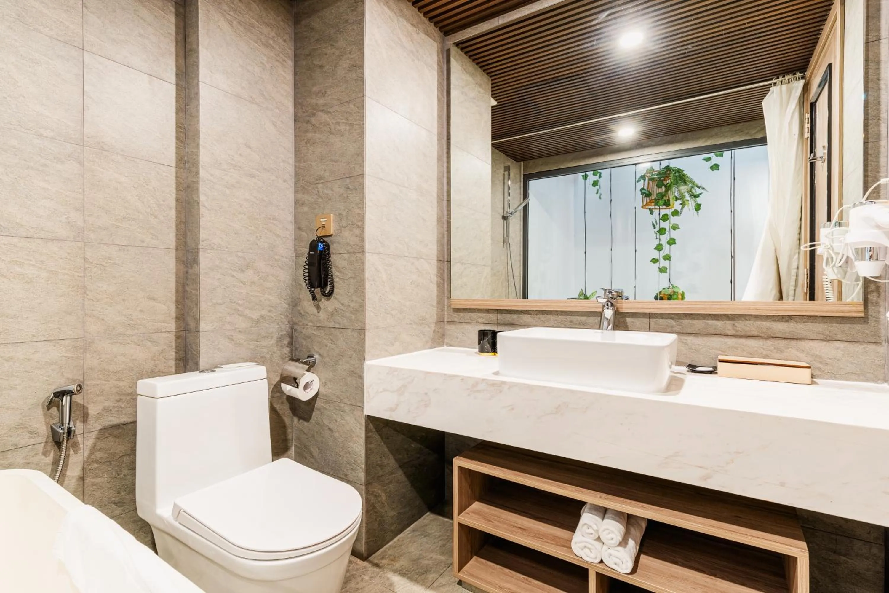 Bathroom in HAIAN Riverfront Hotel Da Nang