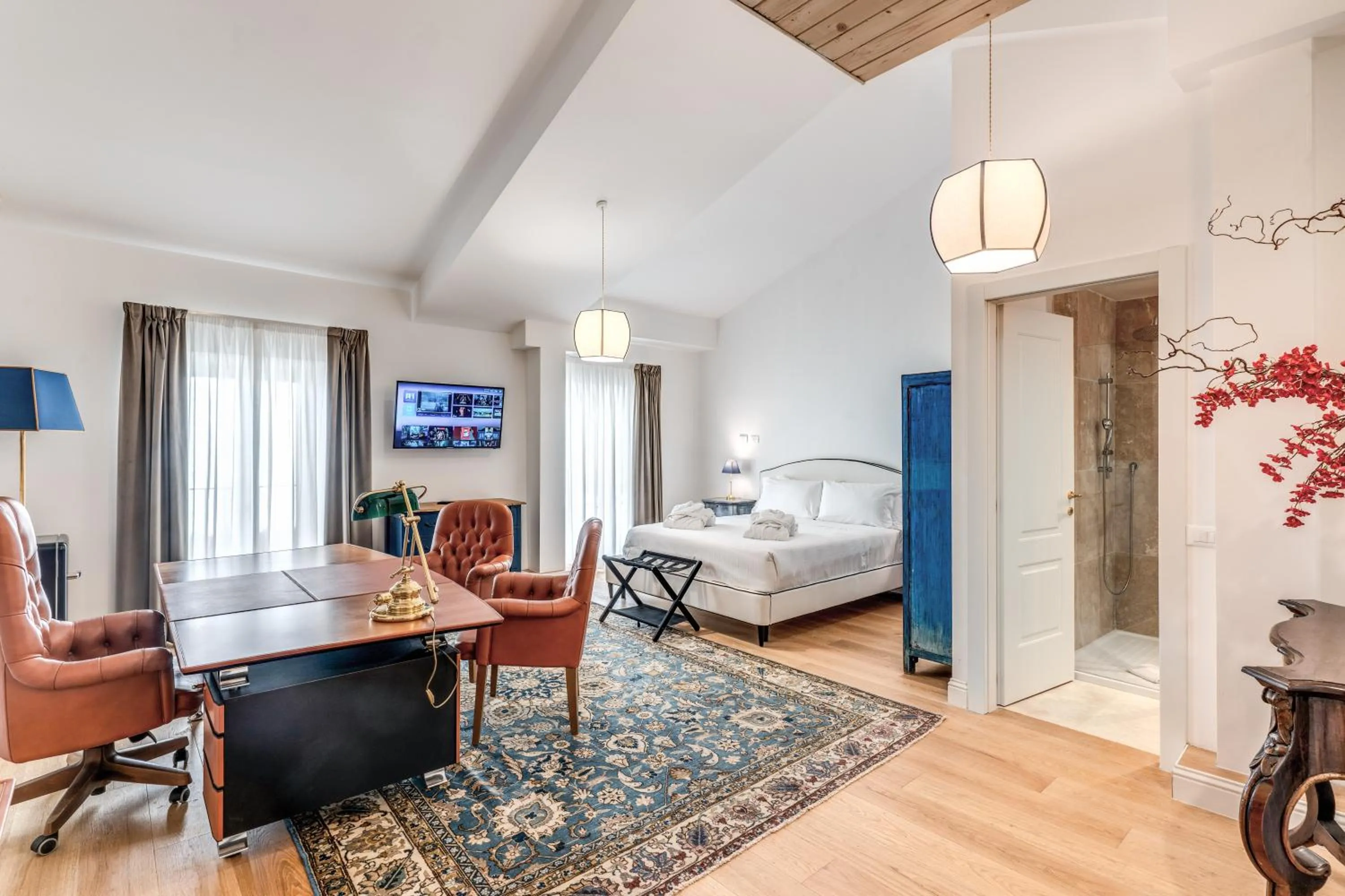 Photo of the whole room, Bed in Suite della Pigna