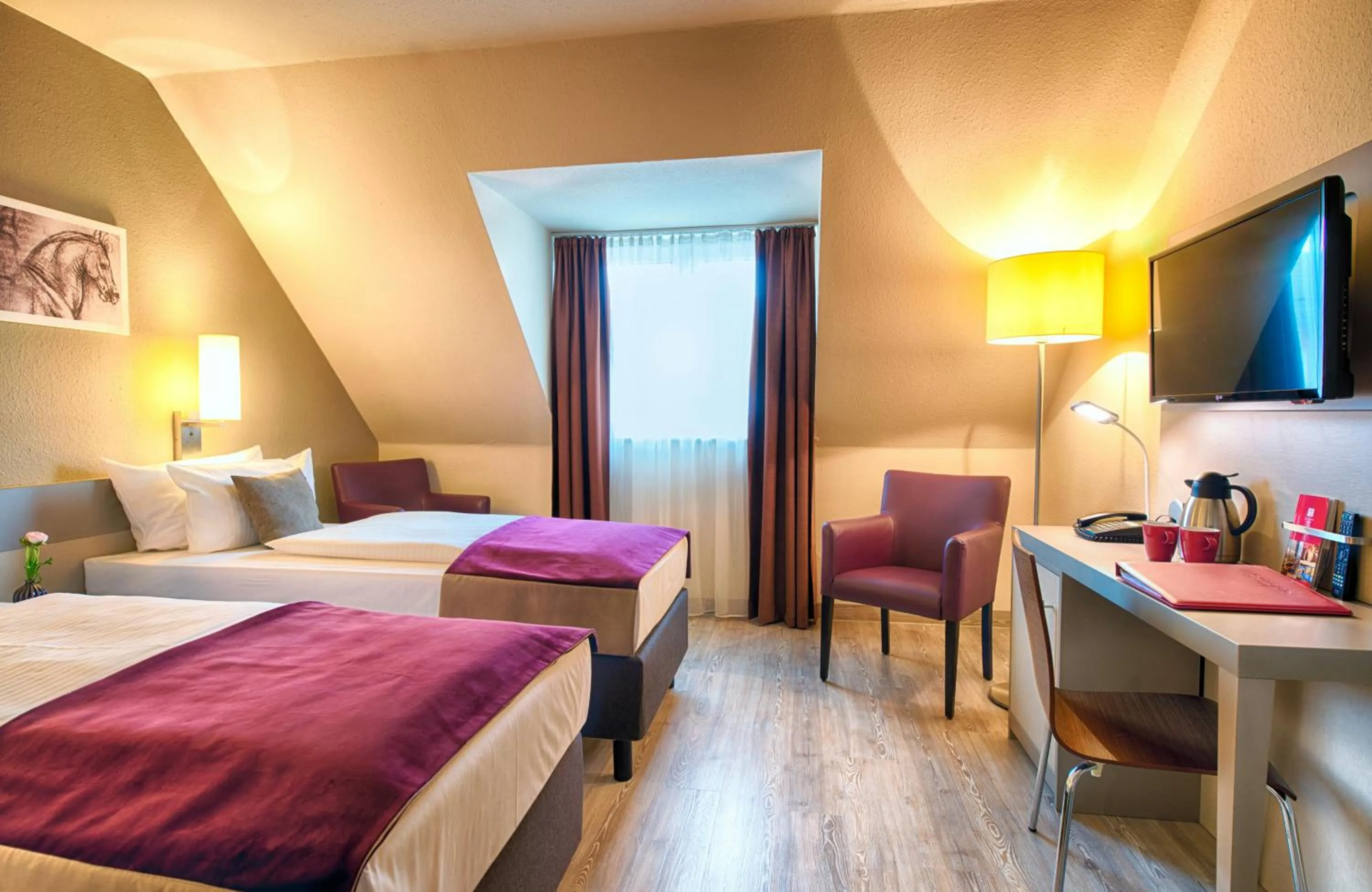 Photo of the whole room, Bed in Leonardo Hotel Mannheim-Ladenburg