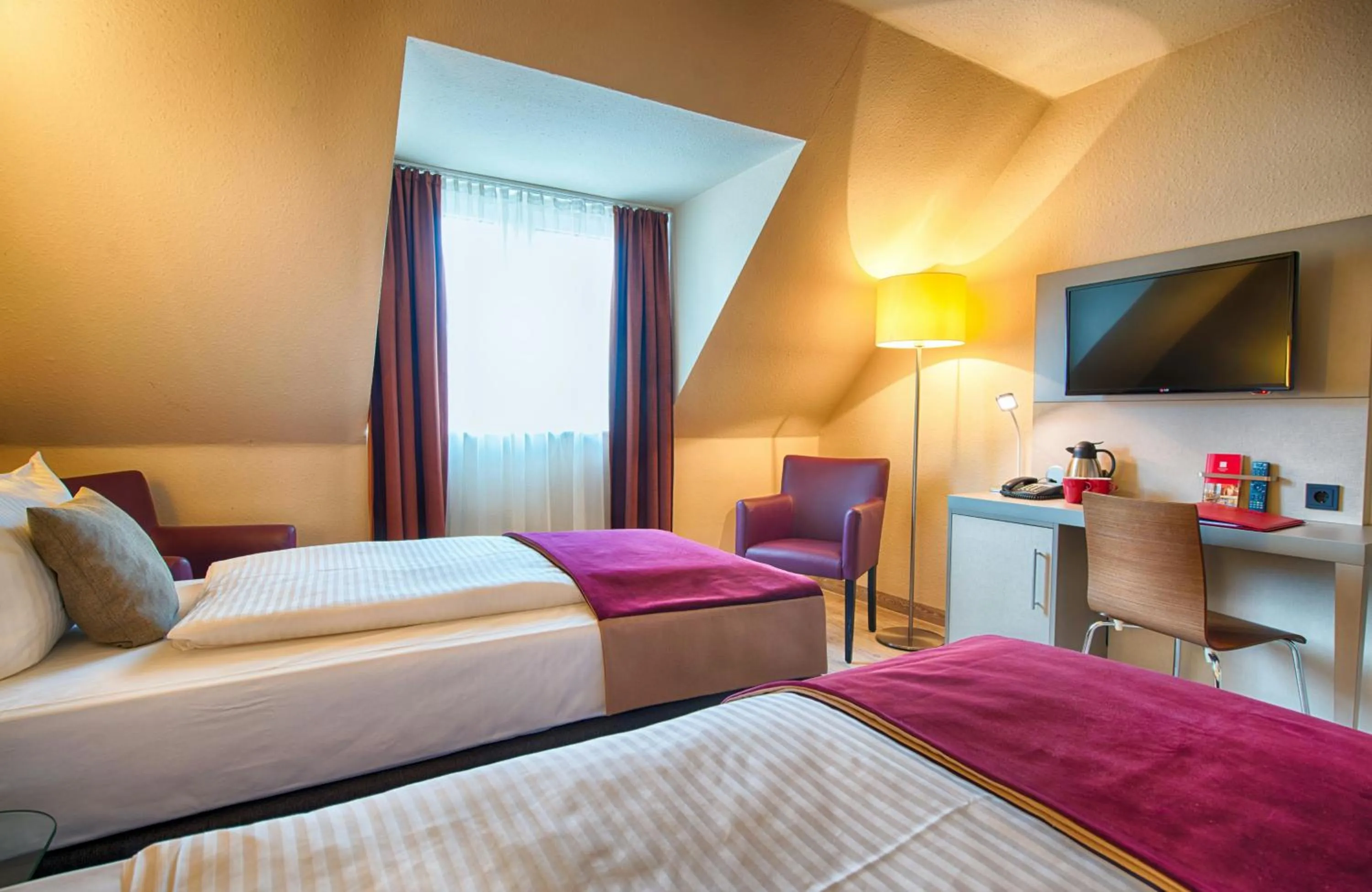 Photo of the whole room, Bed in Leonardo Hotel Mannheim-Ladenburg