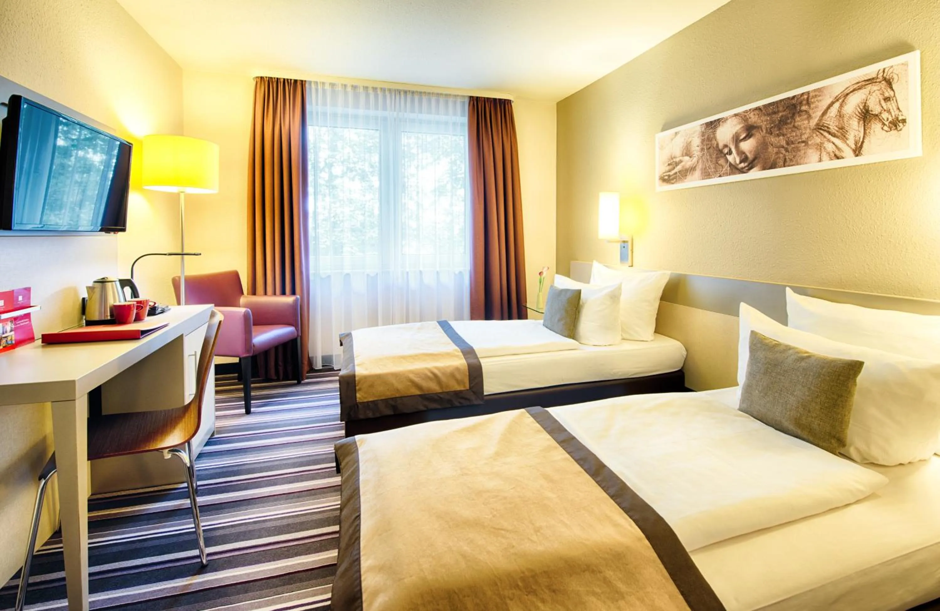 Photo of the whole room, Bed in Leonardo Hotel Mannheim-Ladenburg