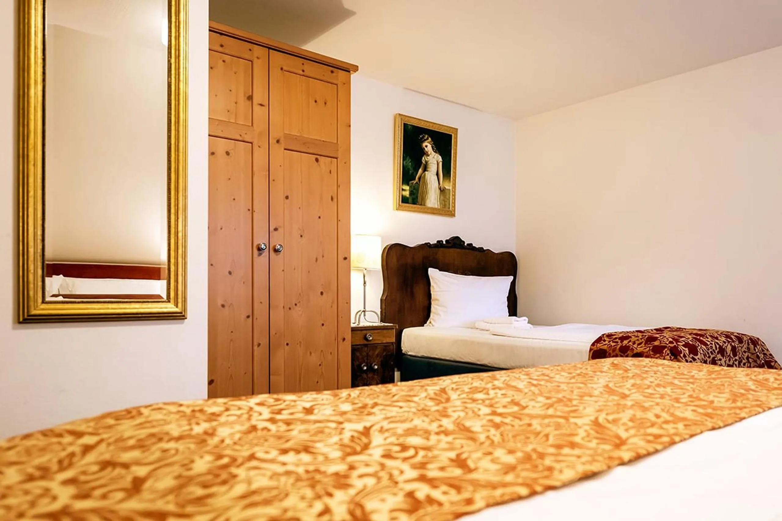 Bed in Apparthotel Bad Schandau by STEIGER Hotels