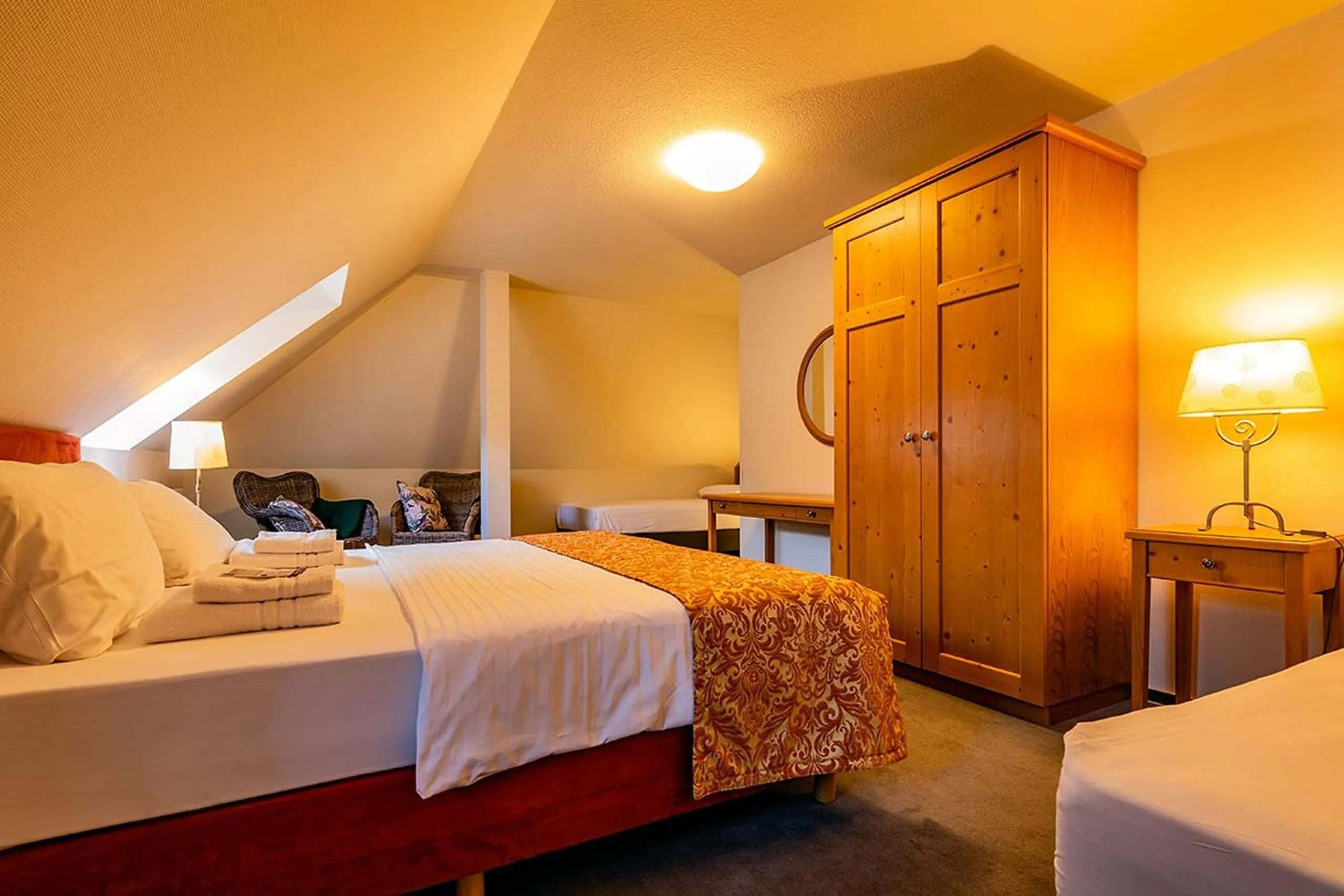 Bed in Apparthotel Bad Schandau by STEIGER Hotels