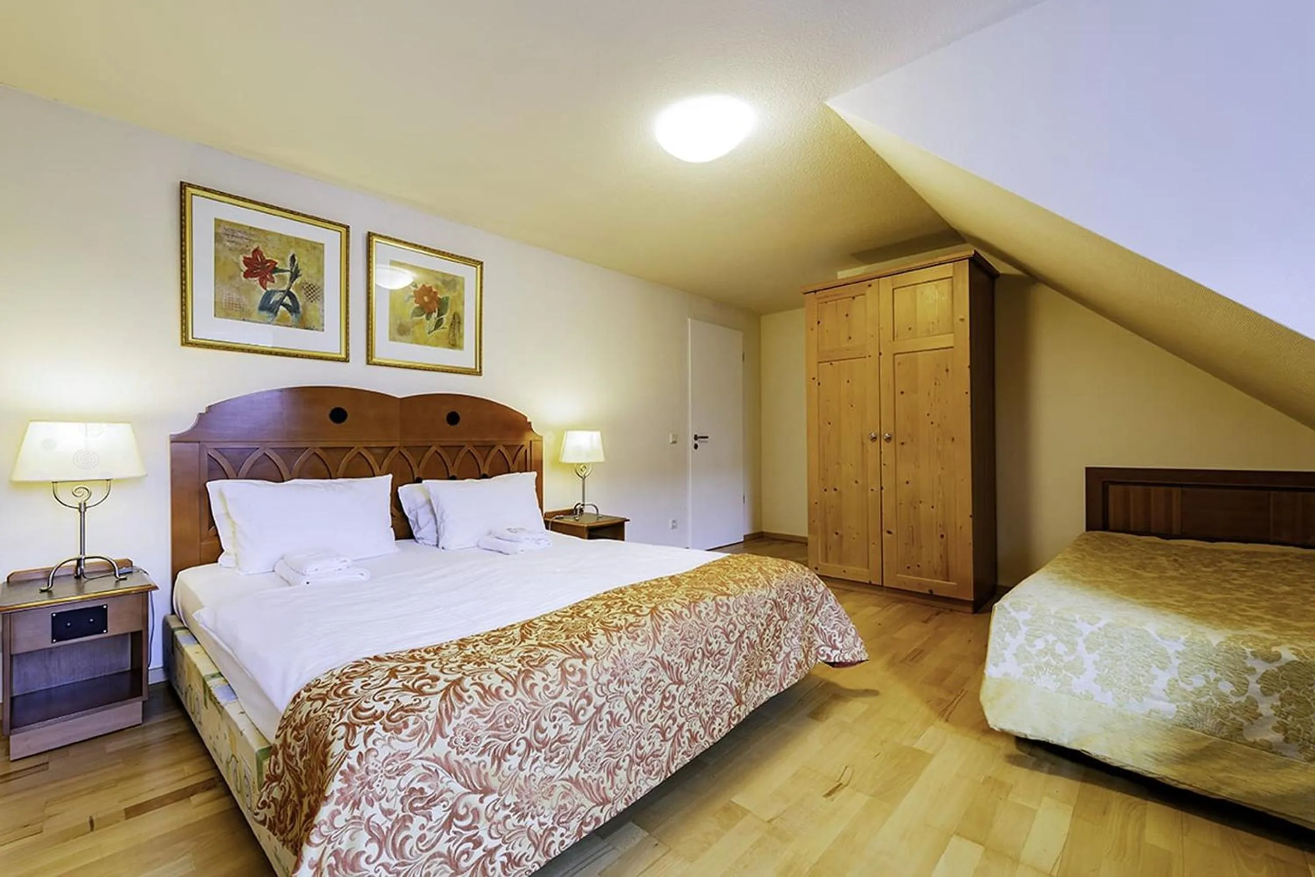 Bed in Apparthotel Bad Schandau by STEIGER Hotels