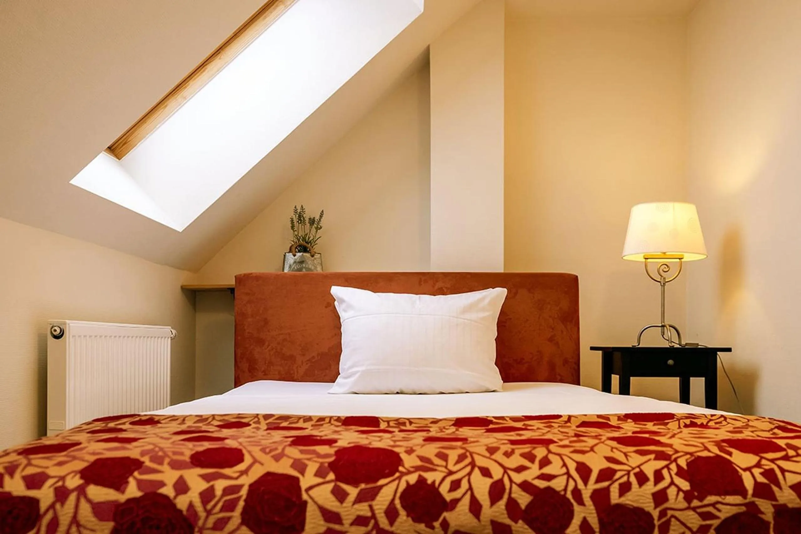 Bed in Apparthotel Bad Schandau by STEIGER Hotels