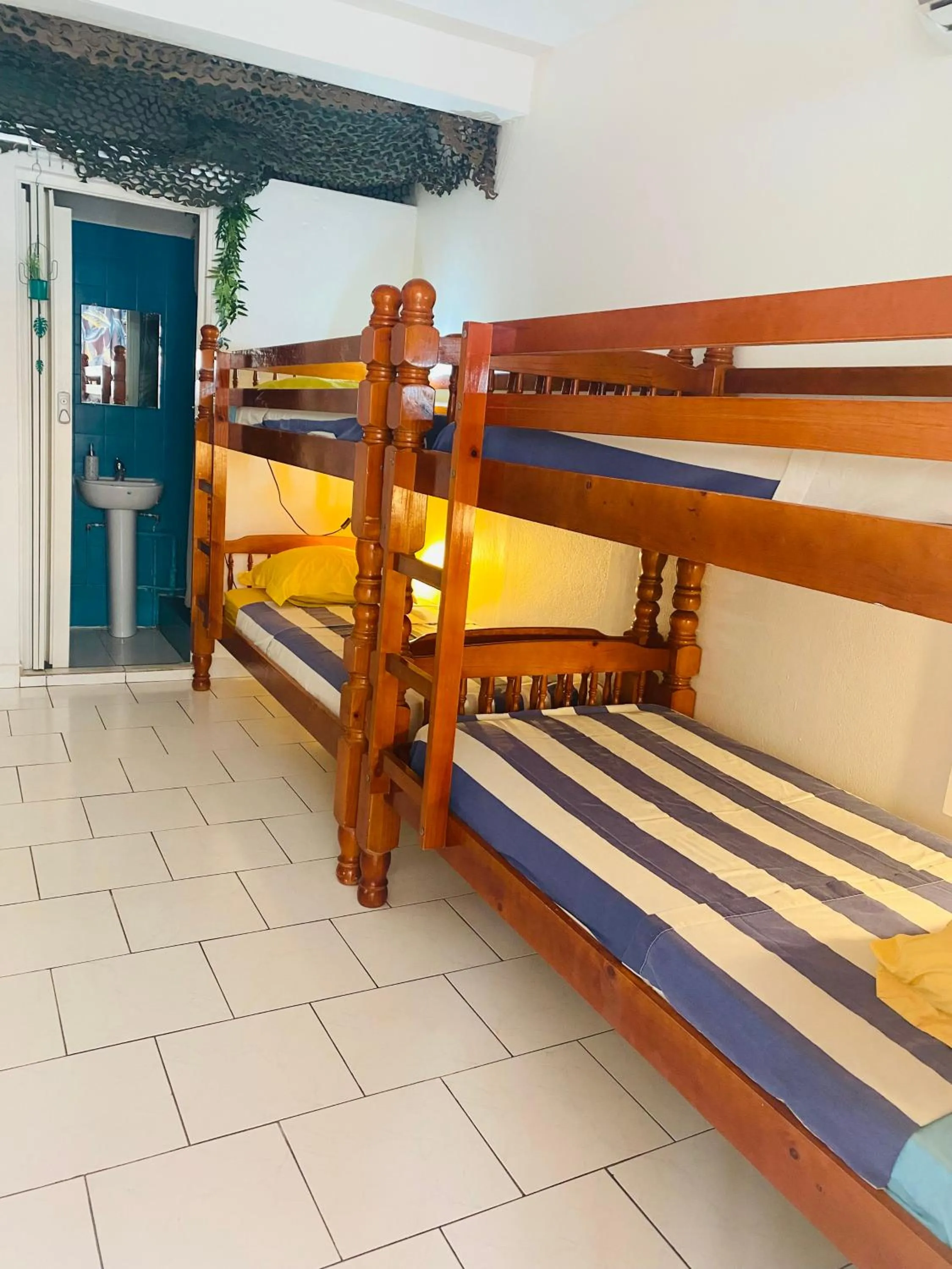 Toilet, Bed in Auberge K-WAN Hostel - Proche Plages