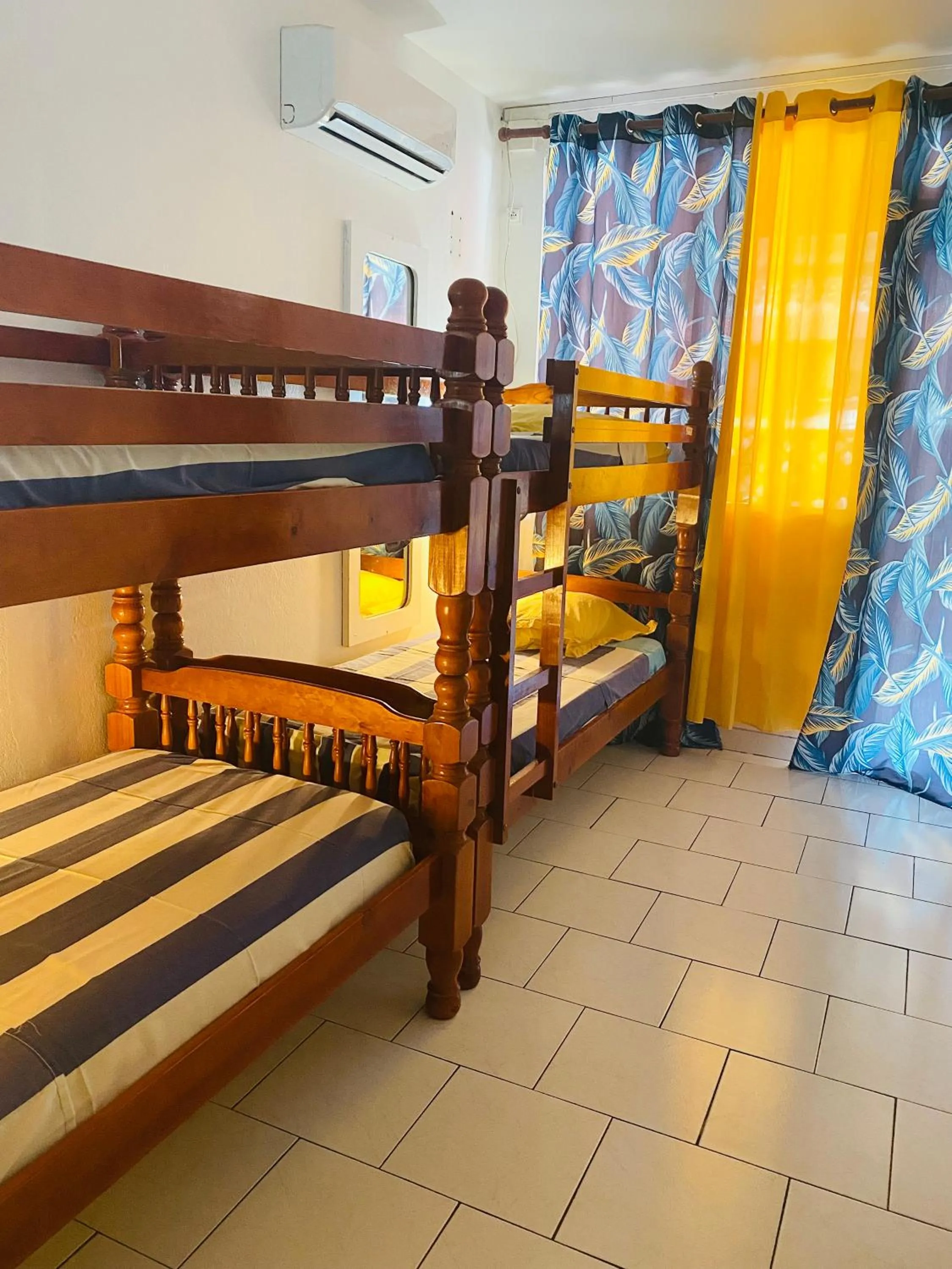 Photo of the whole room, Bed in Auberge K-WAN Hostel - Proche Plages