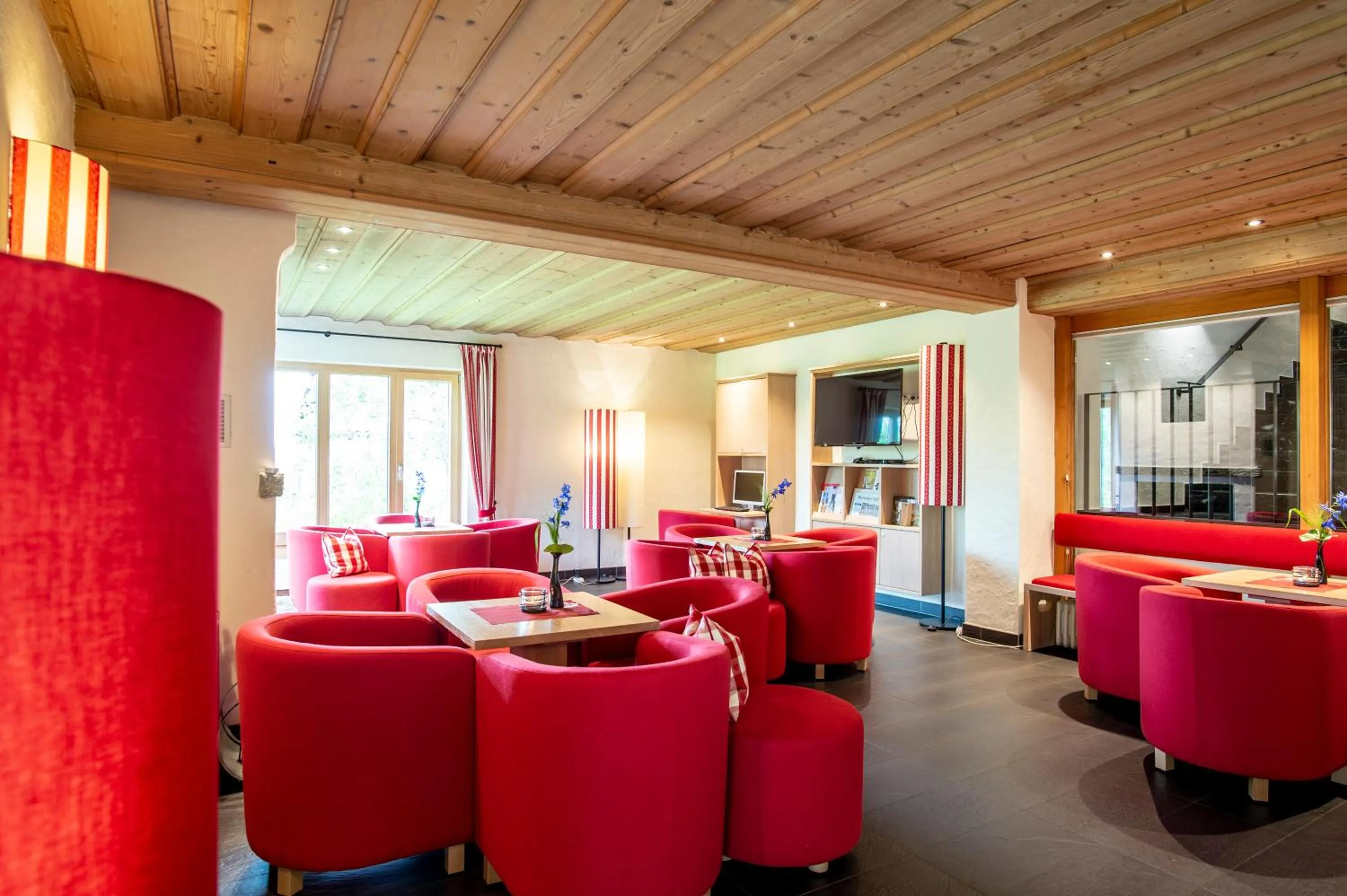 Communal lounge/ TV room in Hotel Alpenblick