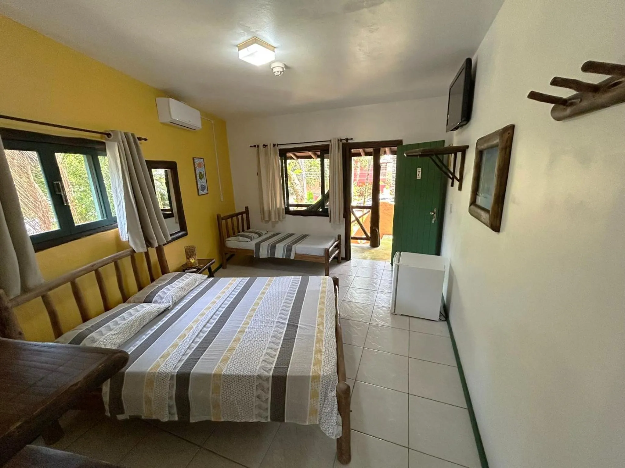 Photo of the whole room, Bed in Pousada Beleza Pura na Praia da Ferrugem