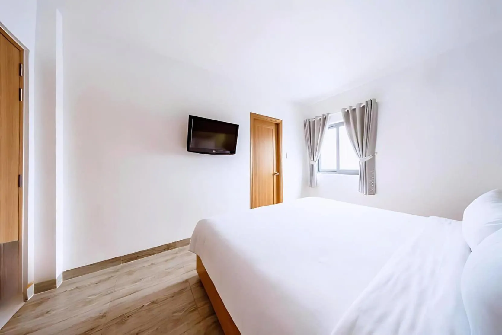 Bed in Happy Life Green Hotel