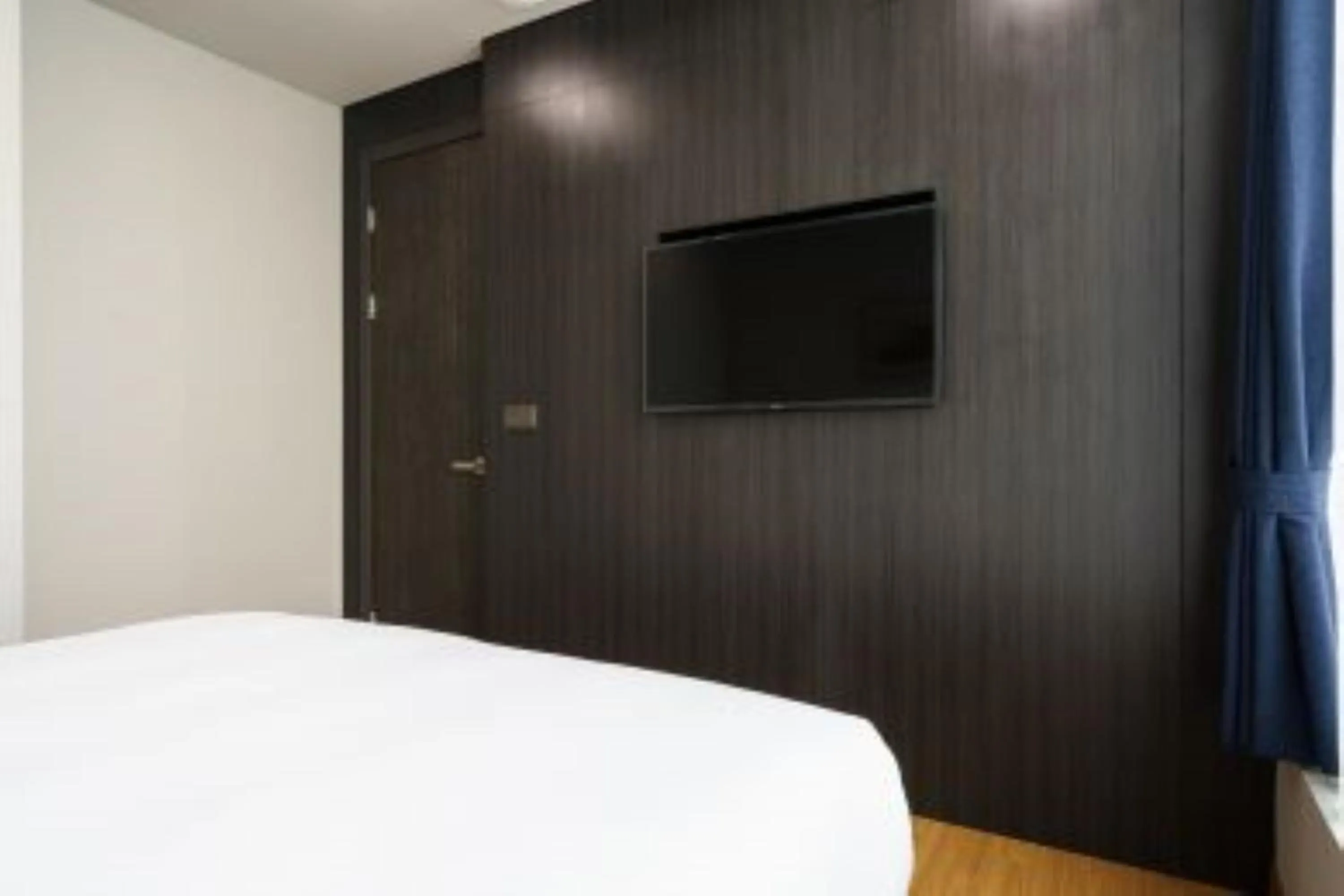 Bed in Kwangsu Hotel Haeundae