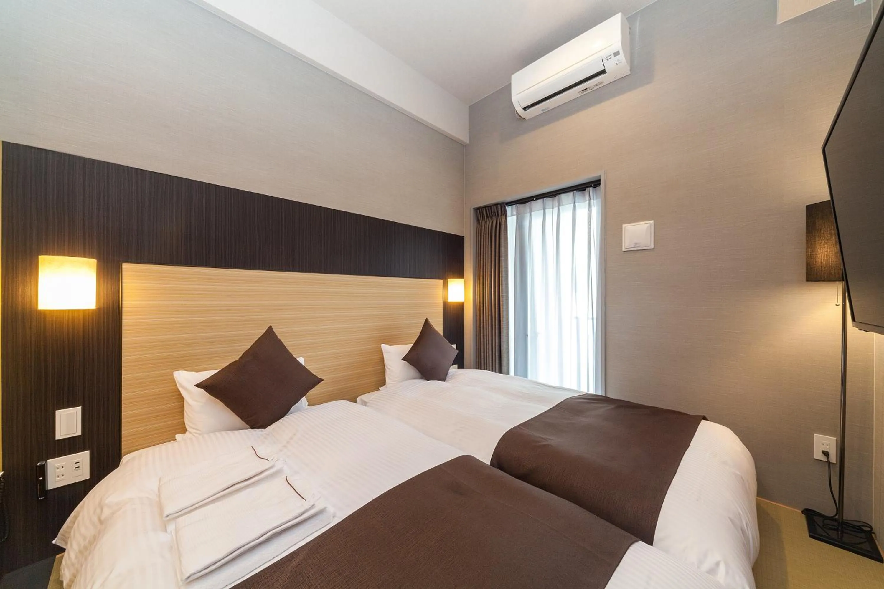 Photo of the whole room, Bed in HOTEL SUITE HIROSHIMA YOKOGAWA