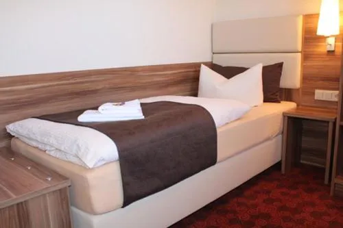 Photo of the whole room, Bed in Hotel Goldener Hirsch