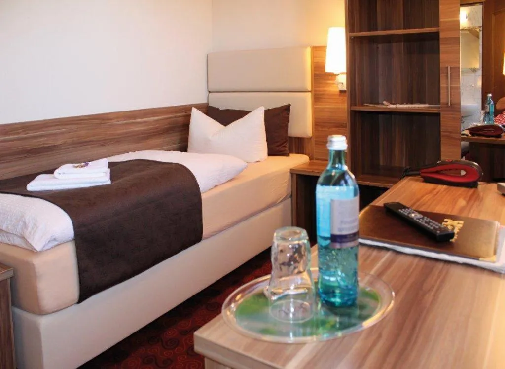 Photo of the whole room, Bed in Hotel Goldener Hirsch