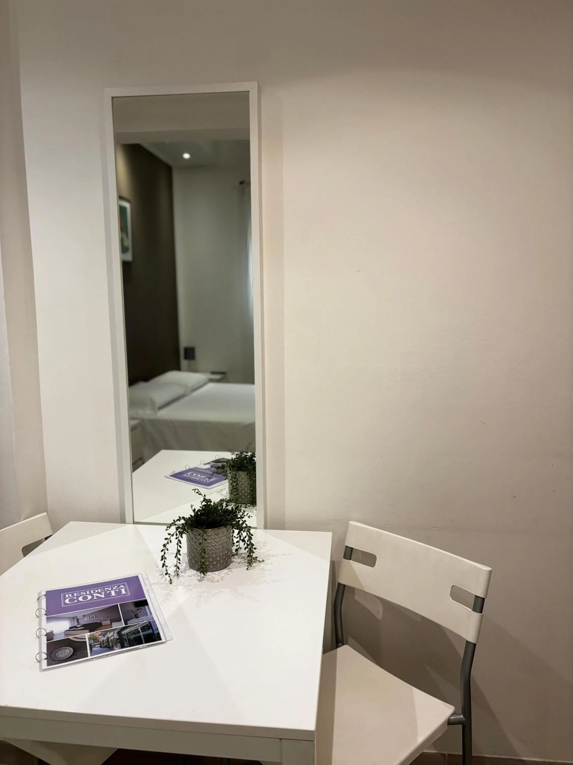 Photo of the whole room, Bed in Residenza Conti