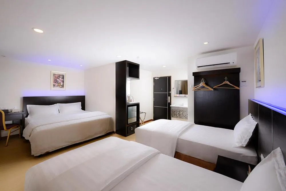 Bed in ERNES Hotel Bayu Mutiara