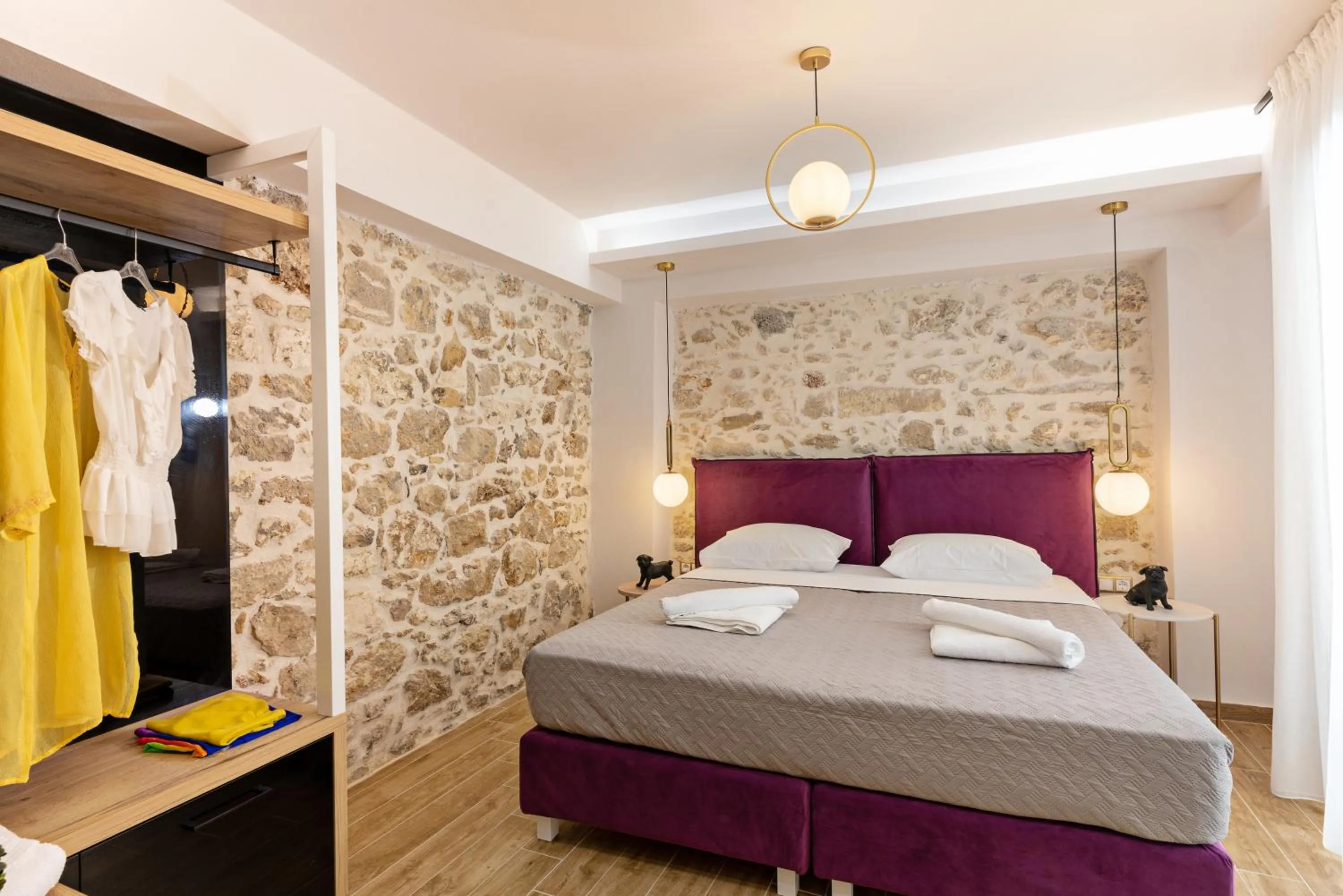 Bed in Erotokritos City Luxury Suites