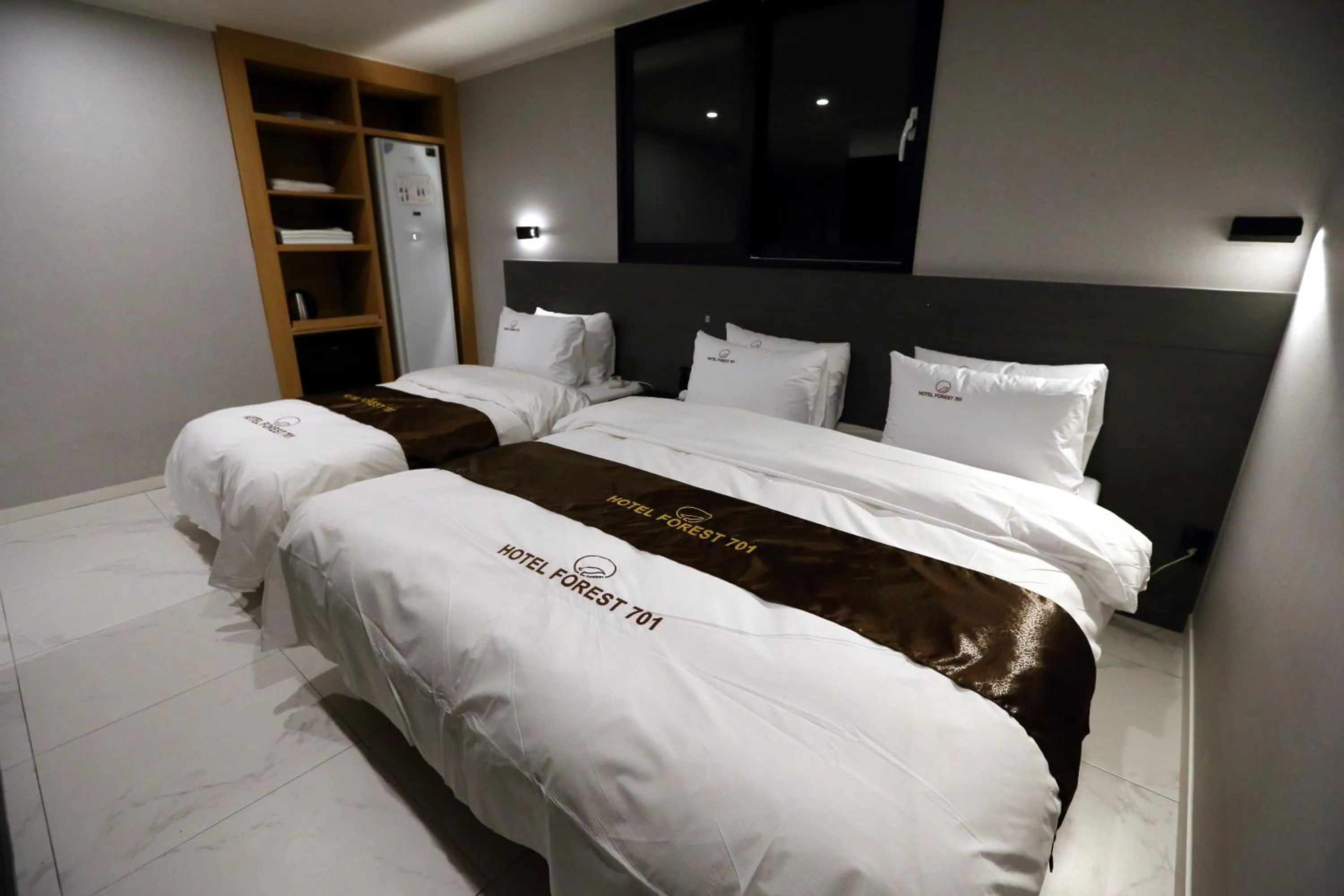 Bed in Forest 701 Hotel