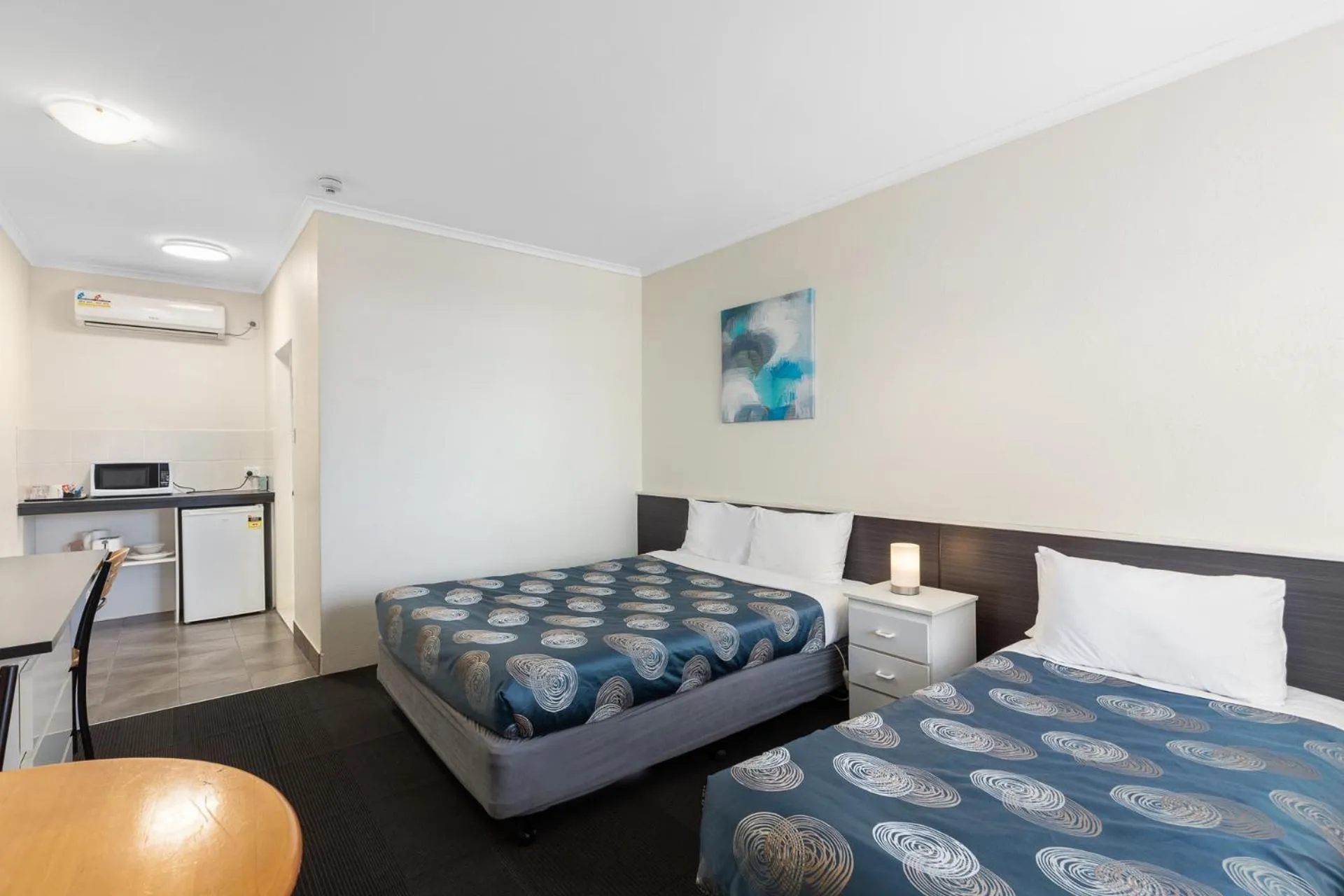 Bed in Red Carpet Motel