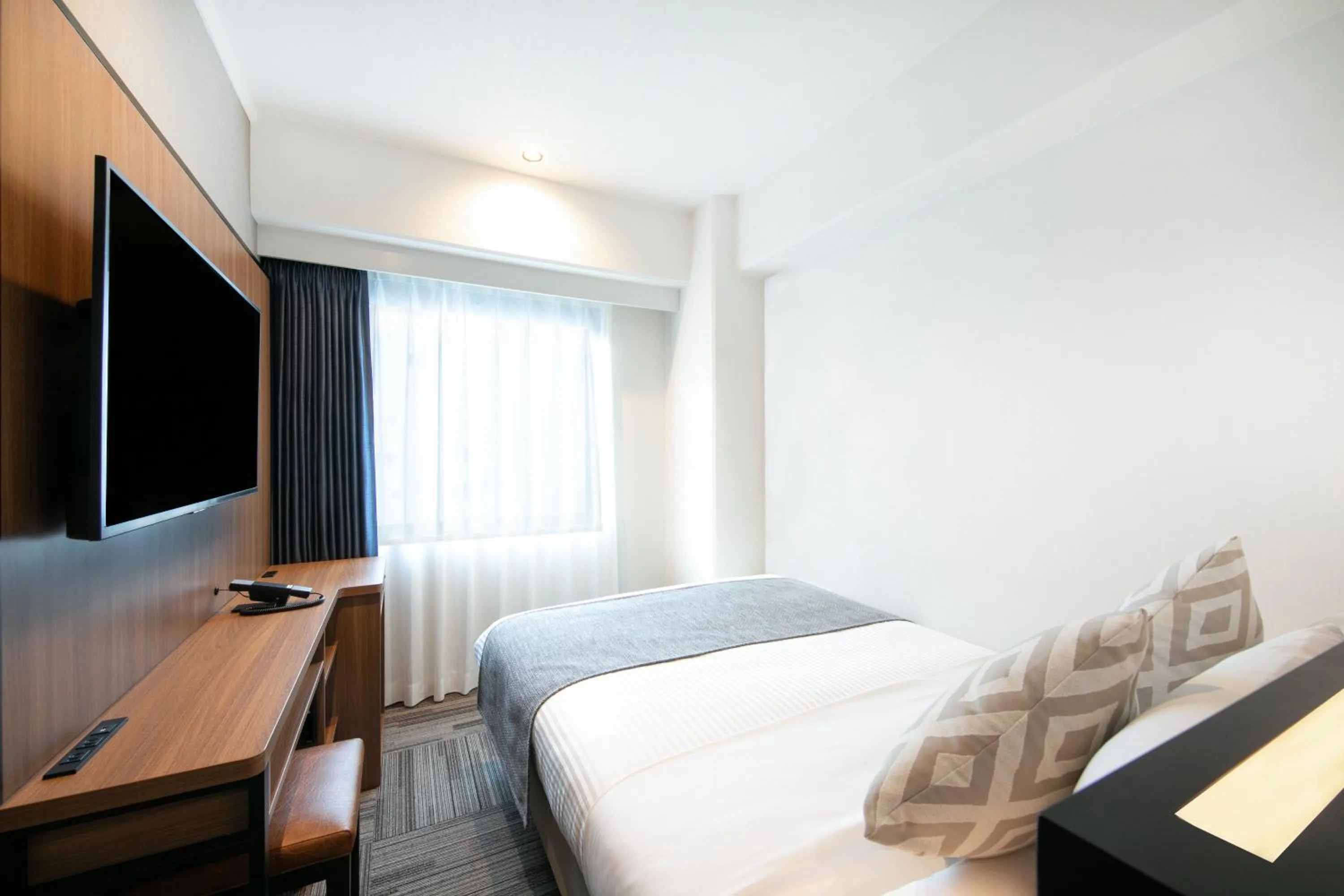 Photo of the whole room, Bed in HOTEL MYSTAYS Kumamoto Riverside