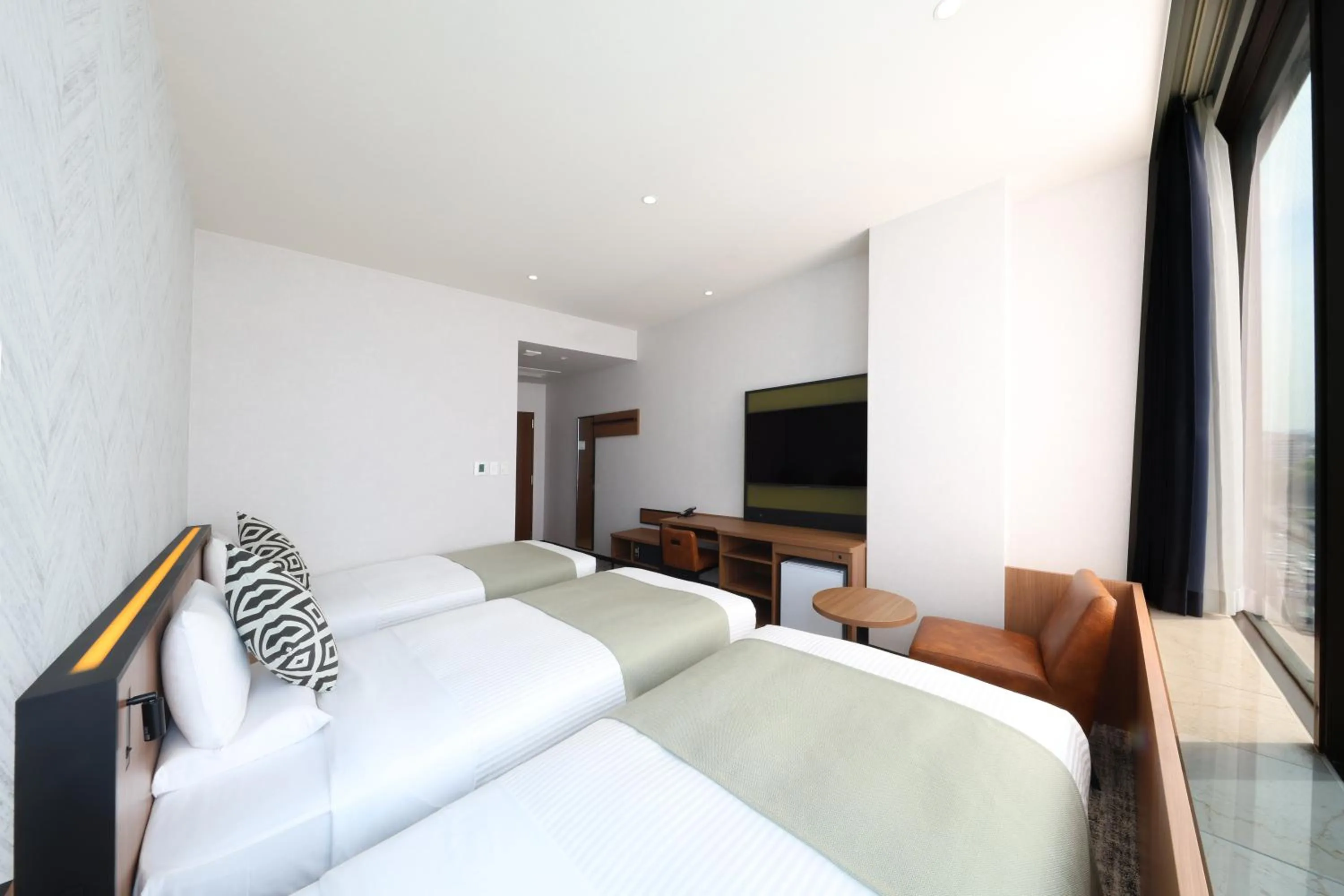 Bed in HOTEL MYSTAYS Kumamoto Riverside