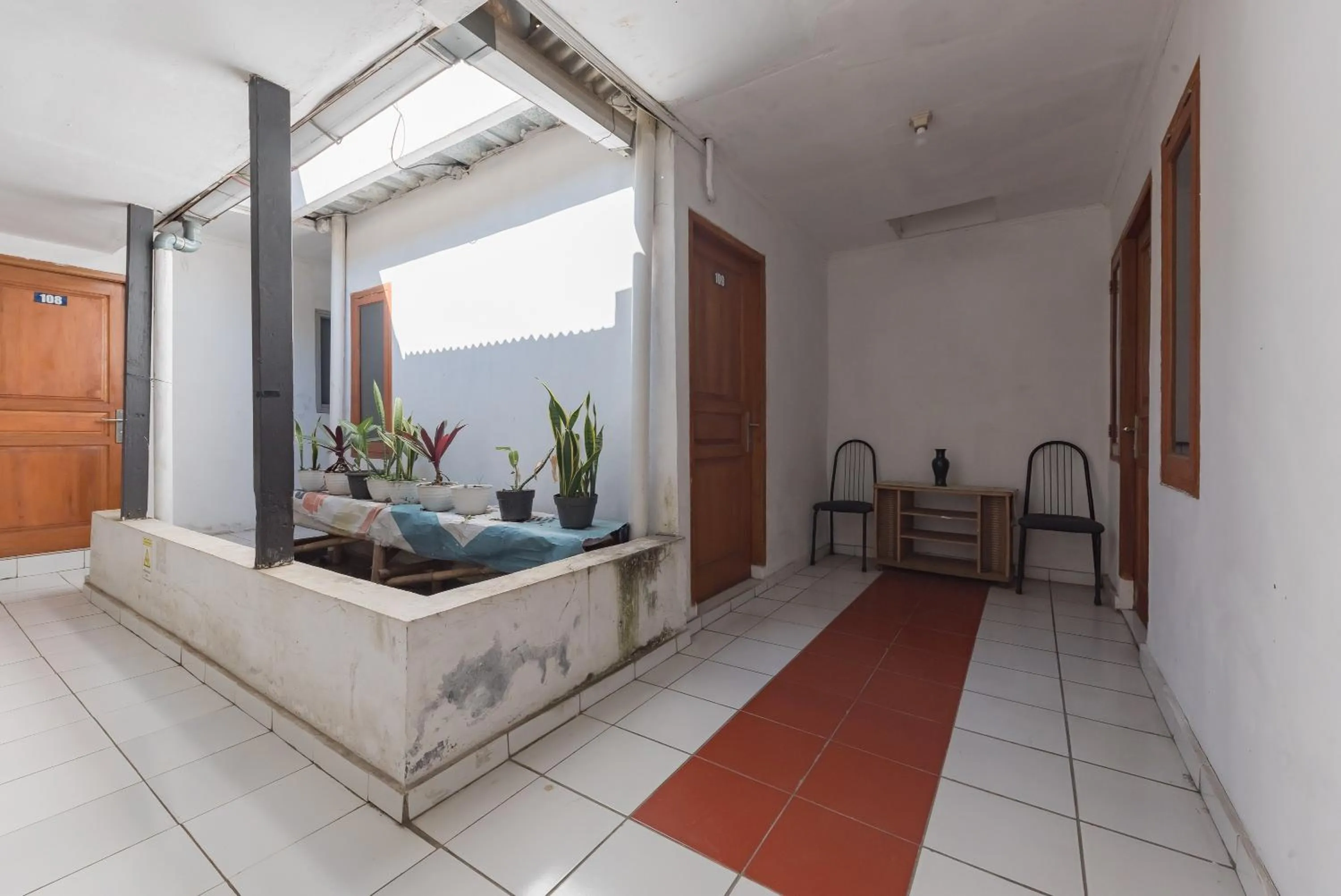 Seating area in RedDoorz Syariah @ Jl Raya Sukabumi