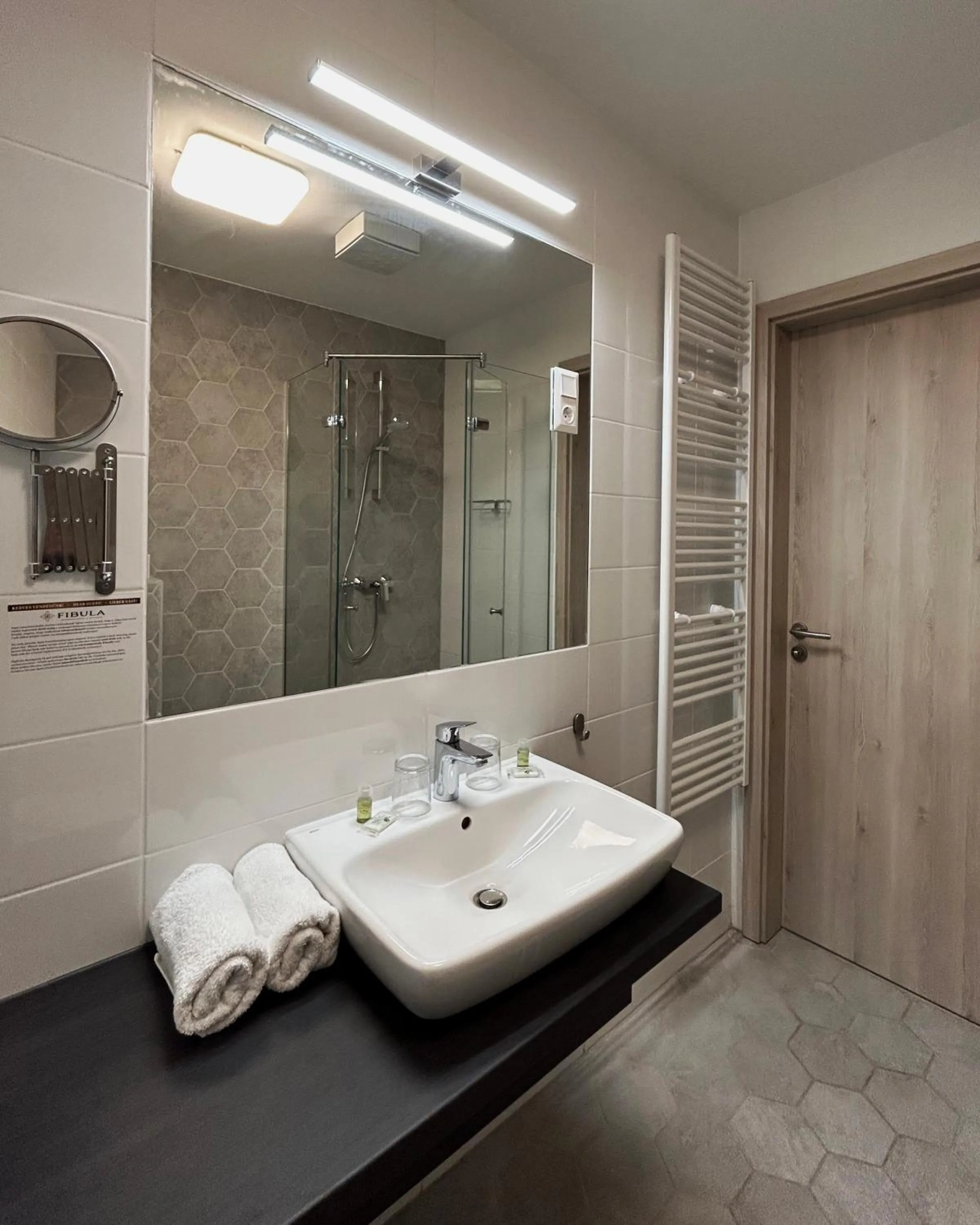 Bathroom in Fibula Residence Hotel & Wellness - Adults Only