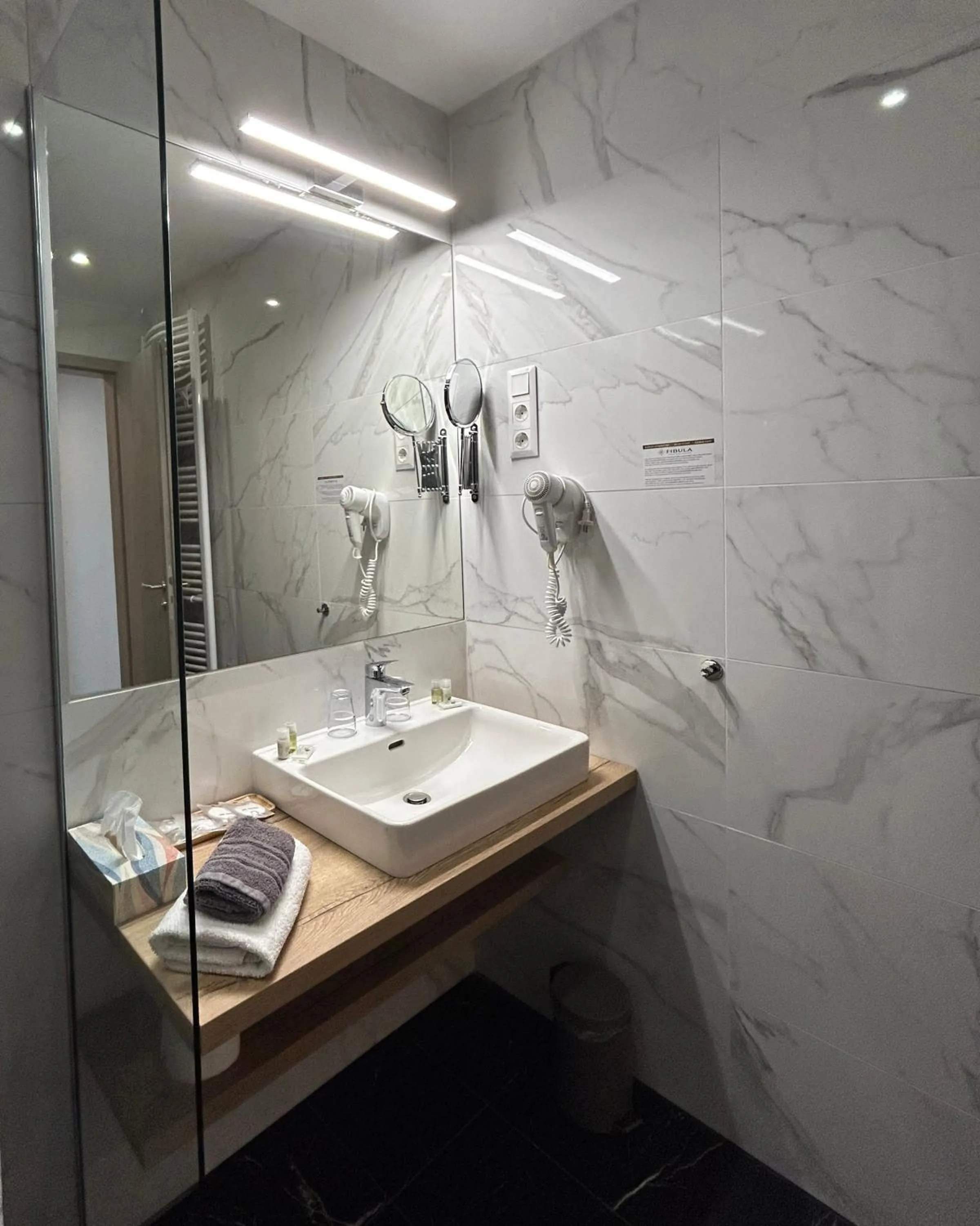 Bathroom in Fibula Residence Hotel & Wellness - Adults Only