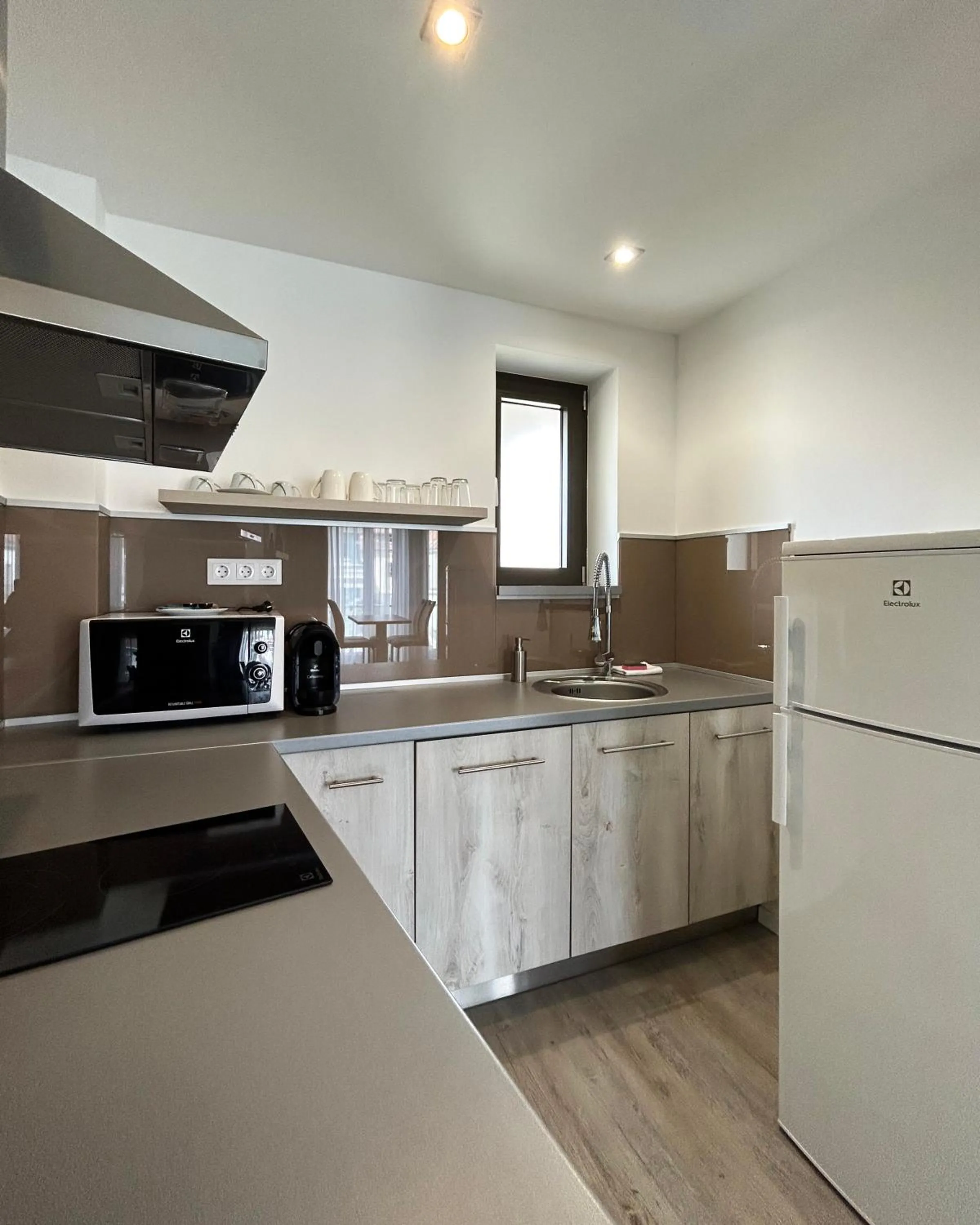 Kitchen or kitchenette in Fibula Residence Hotel & Wellness - Adults Only