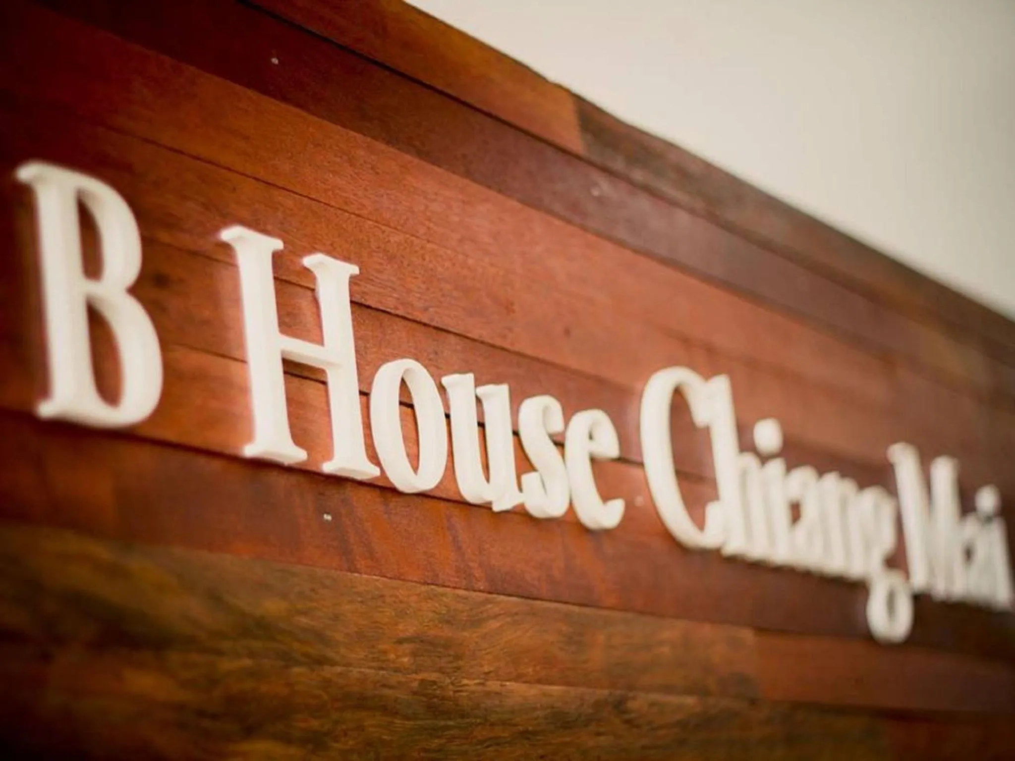 Property logo or sign in B House Chiang Mai Thailand