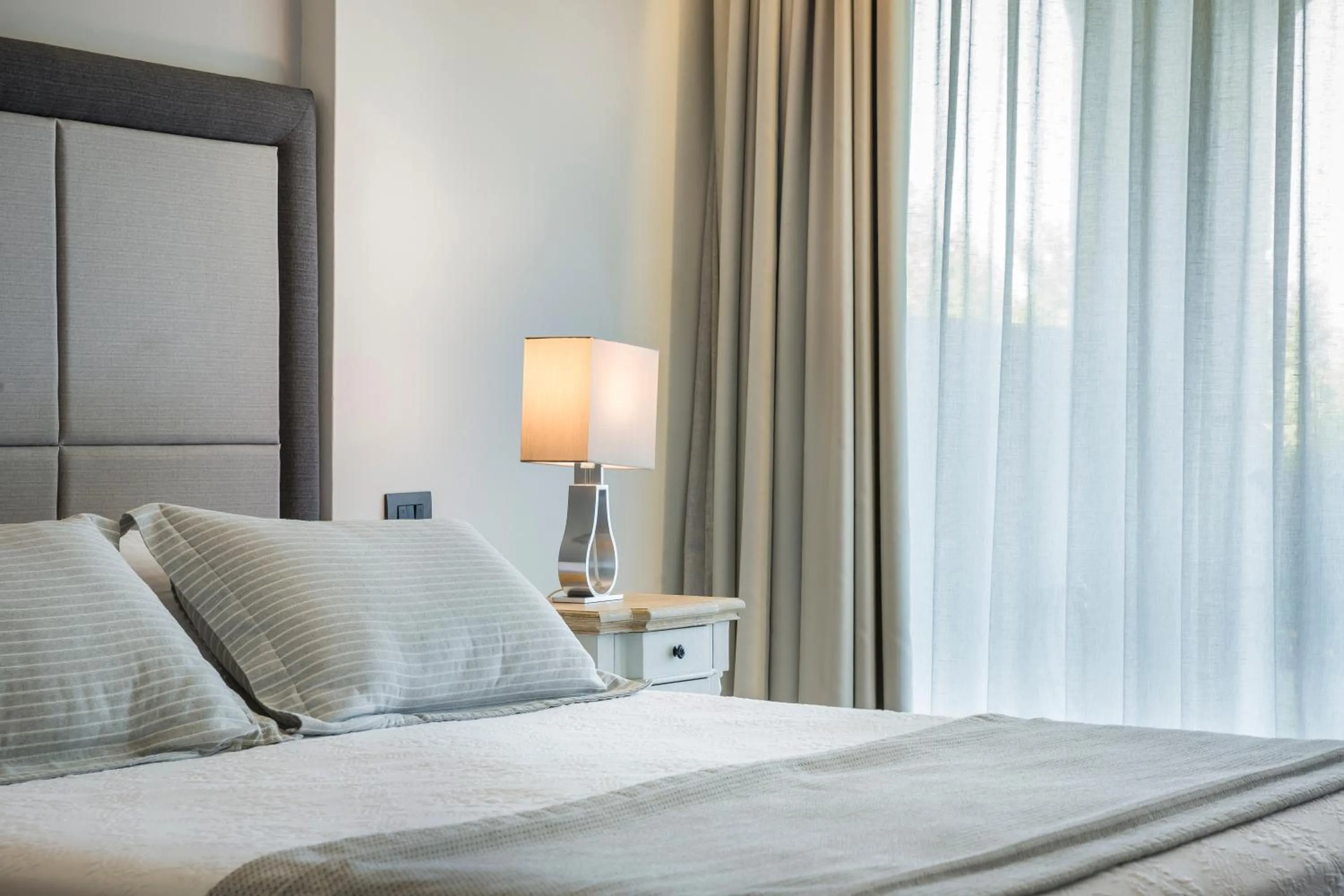 Bed in ASTRA Village Resort