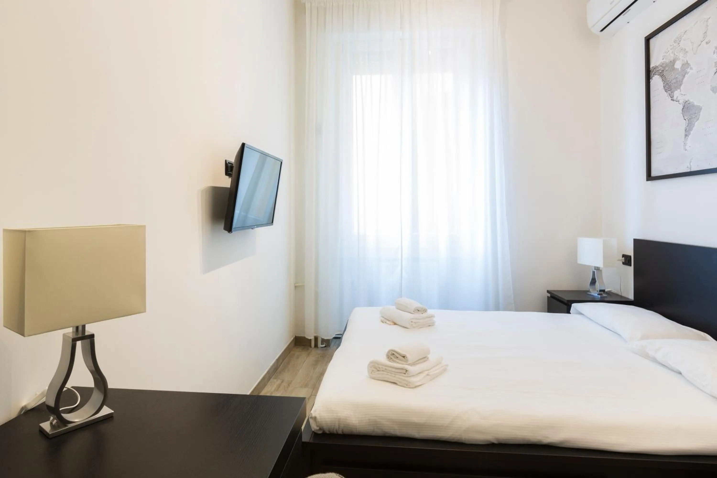 Bed in Yellow Line Apartment