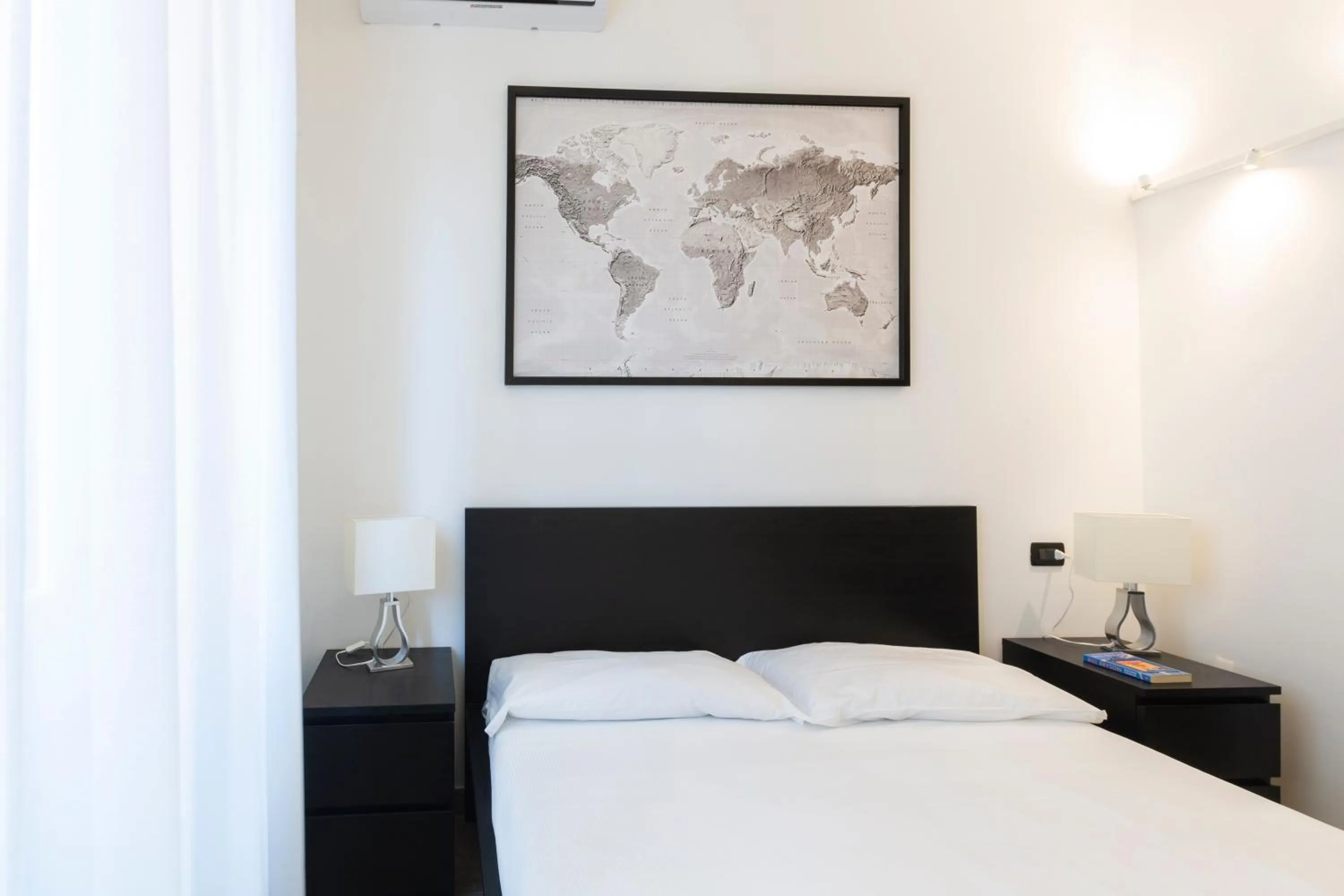 Bed in Yellow Line Apartment