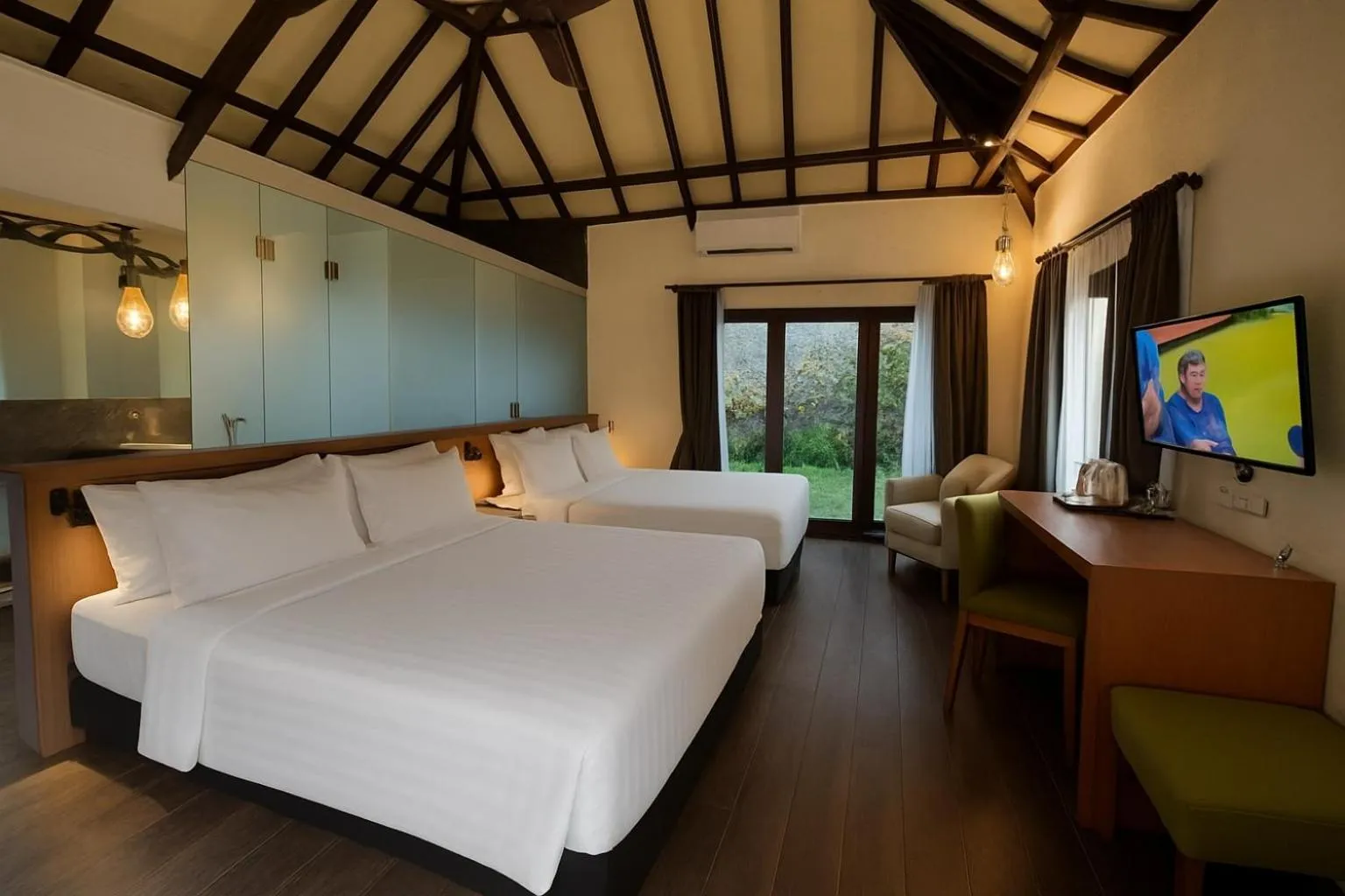 Communal lounge/ TV room, Bed in The Batu Hotel & Villas