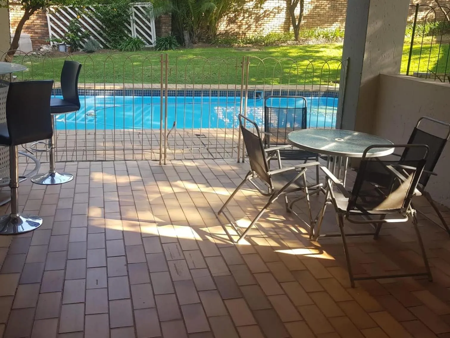 Pool view in Royal Olympia Lodges & Safaris RSA