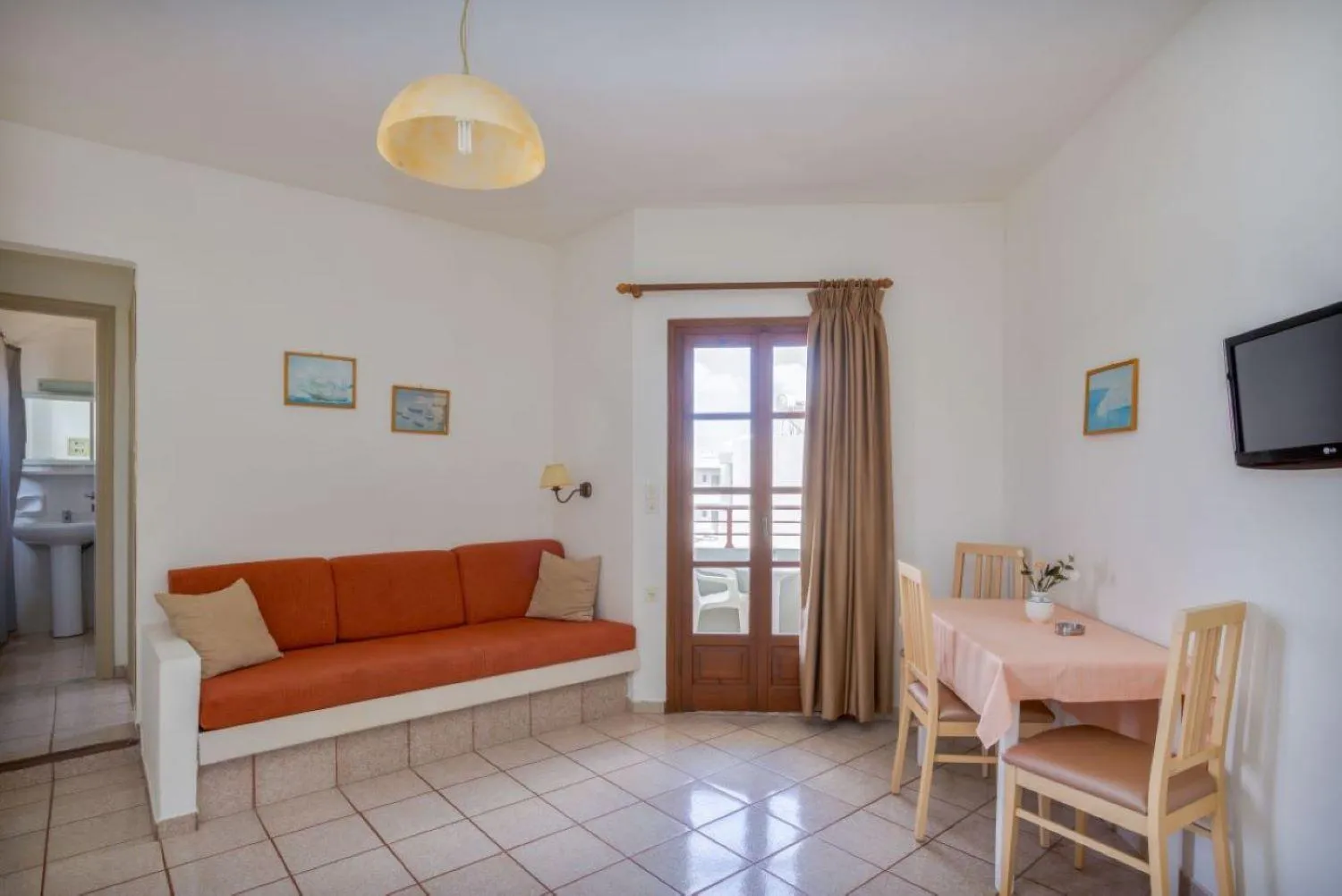 Toilet in John Mary Apartments by Estia