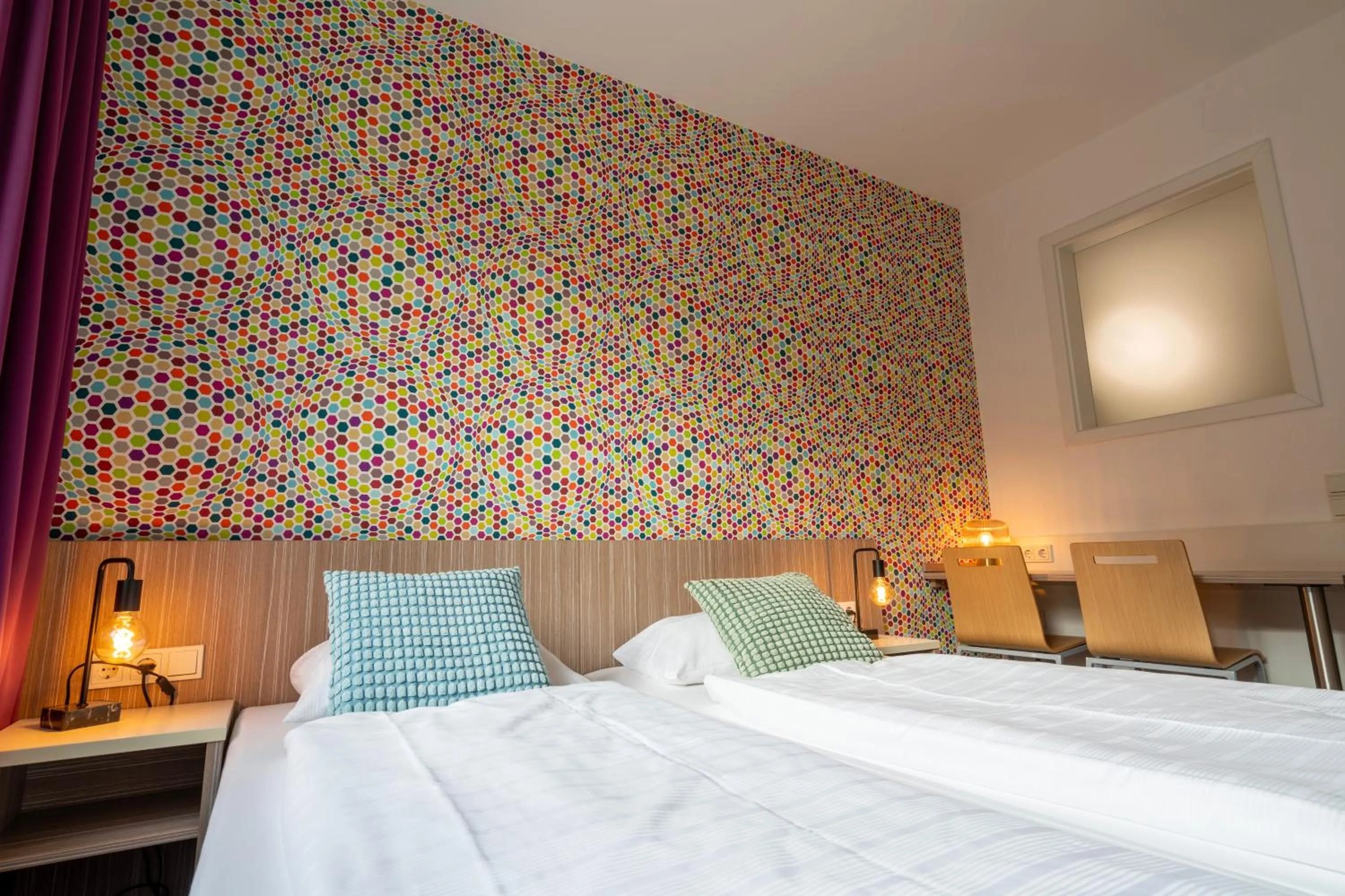 Living room, Bed in Hotel Madeleine Biohotel