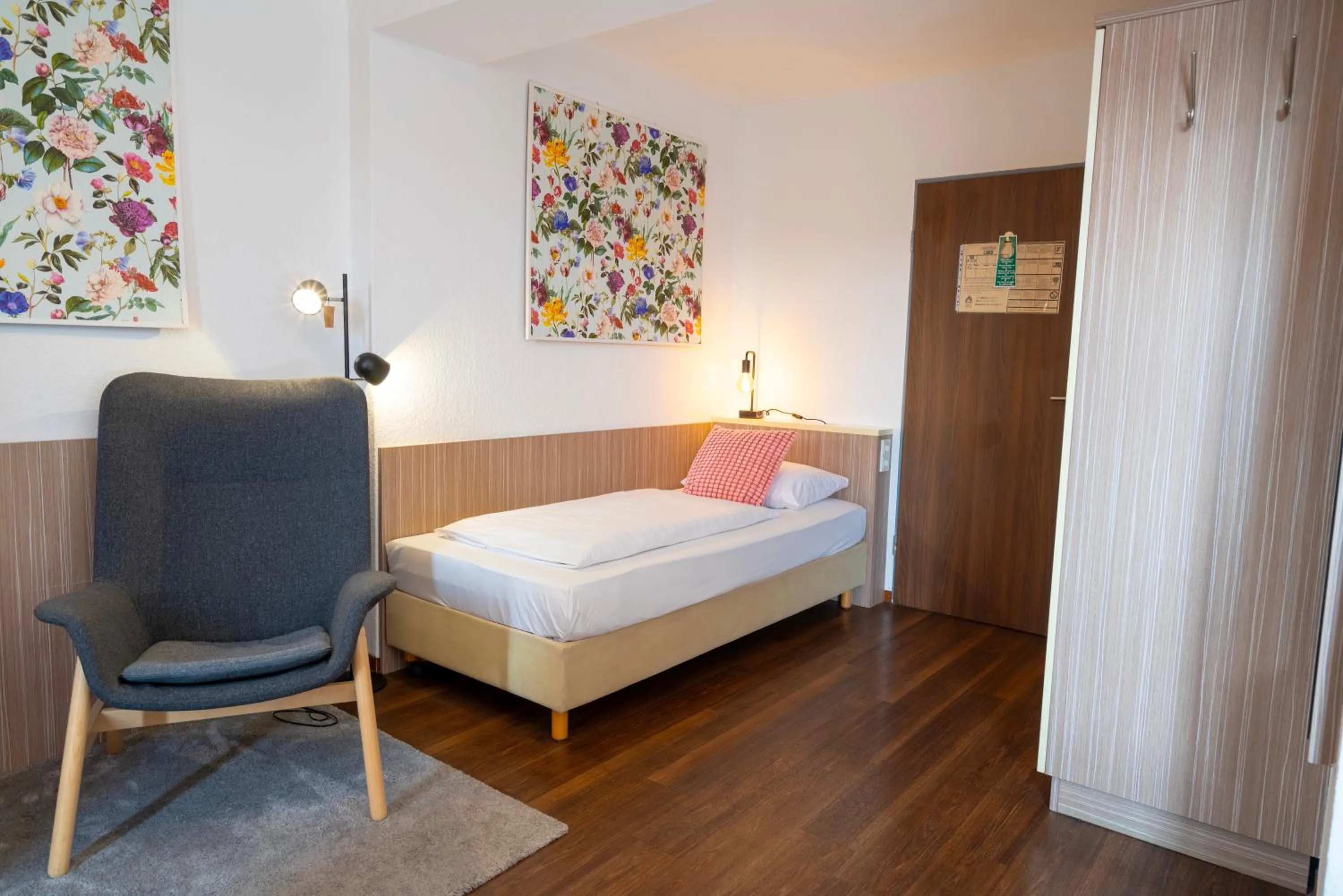 Living room, Bed in Hotel Madeleine Biohotel