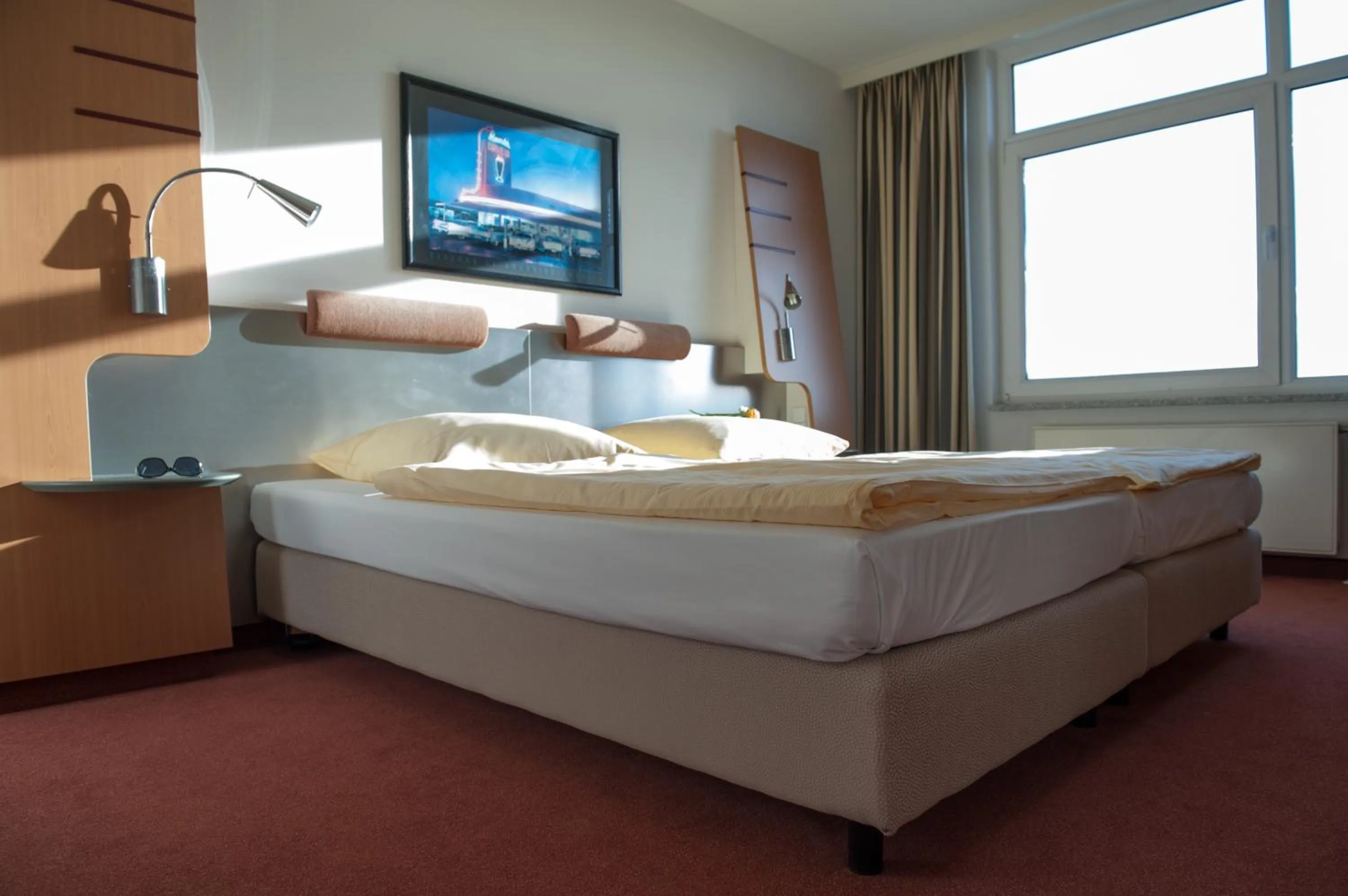 View (from property/room), Bed in Hotel Motorsport Arena