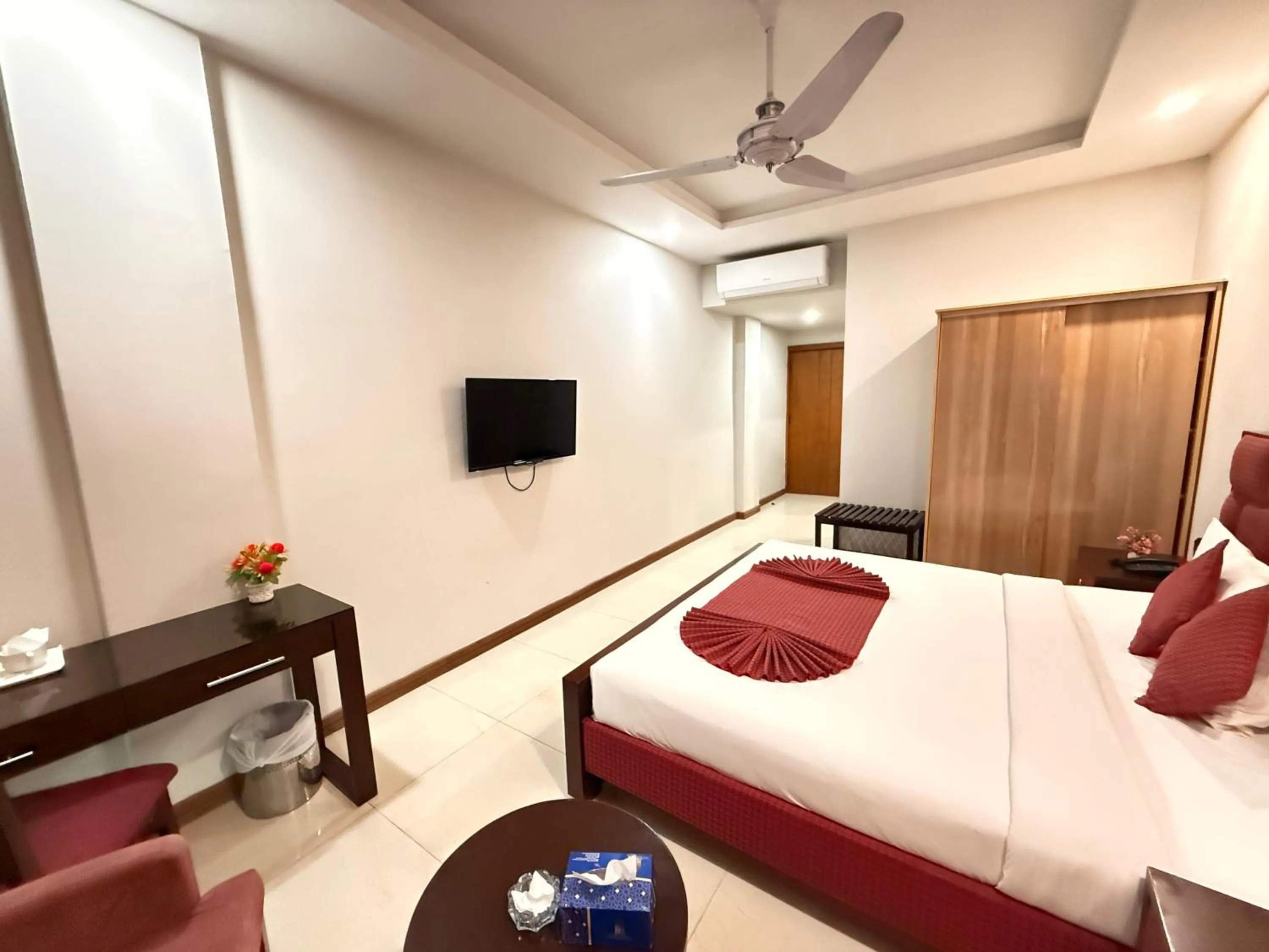 Bed in Atlas Hotel Islamabad