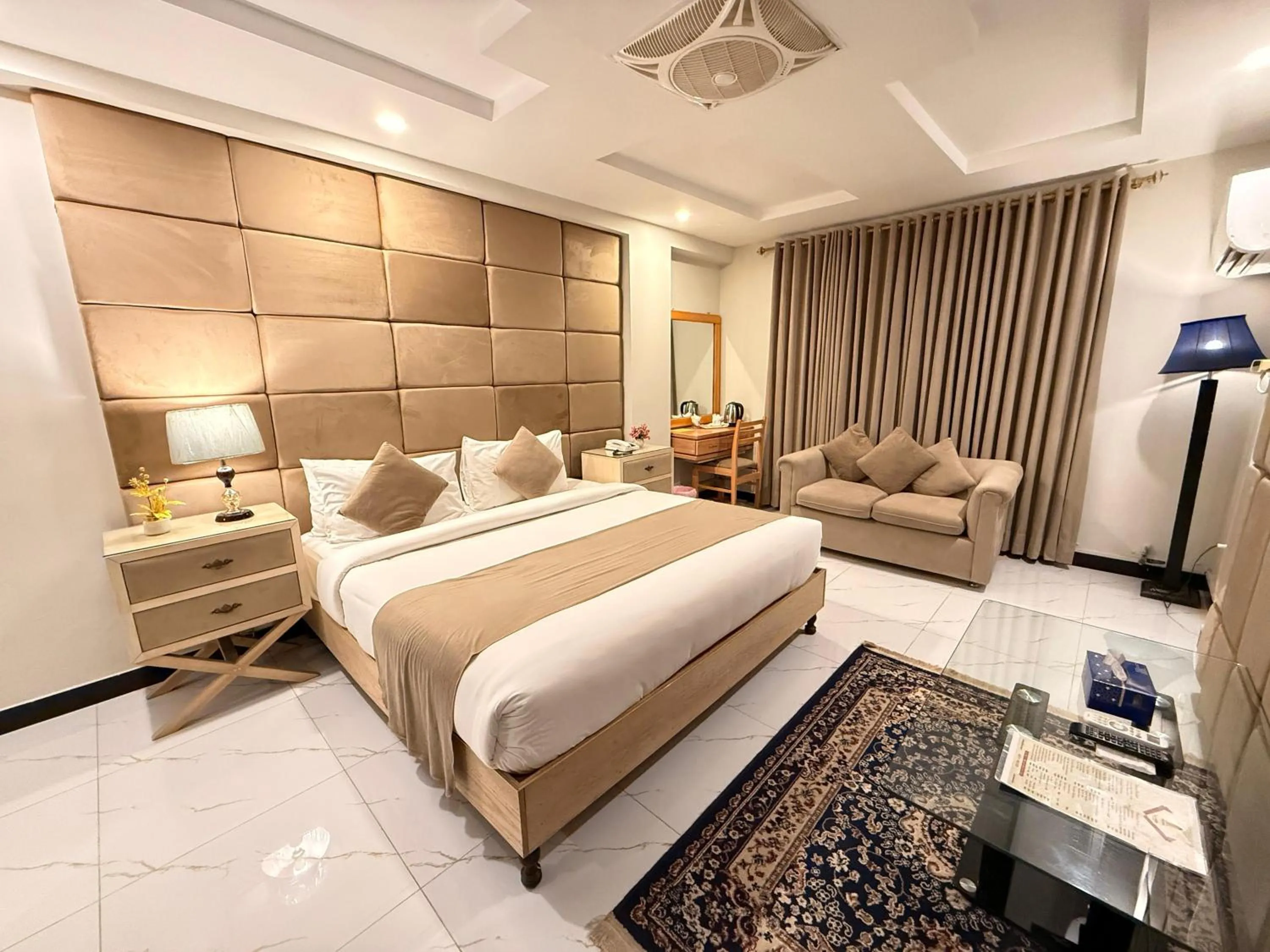 Bed in Atlas Hotel Islamabad