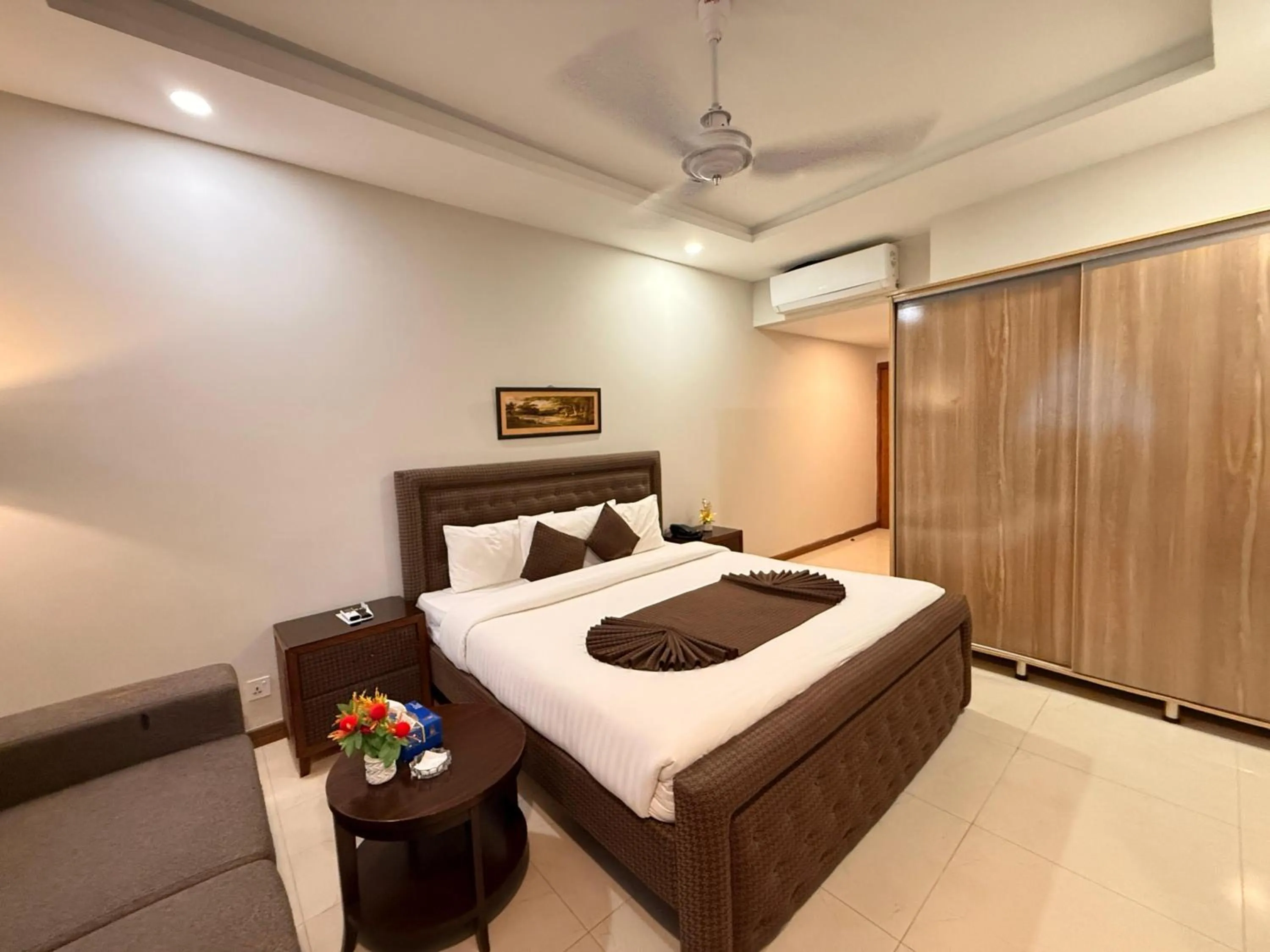 Bed in Atlas Hotel Islamabad