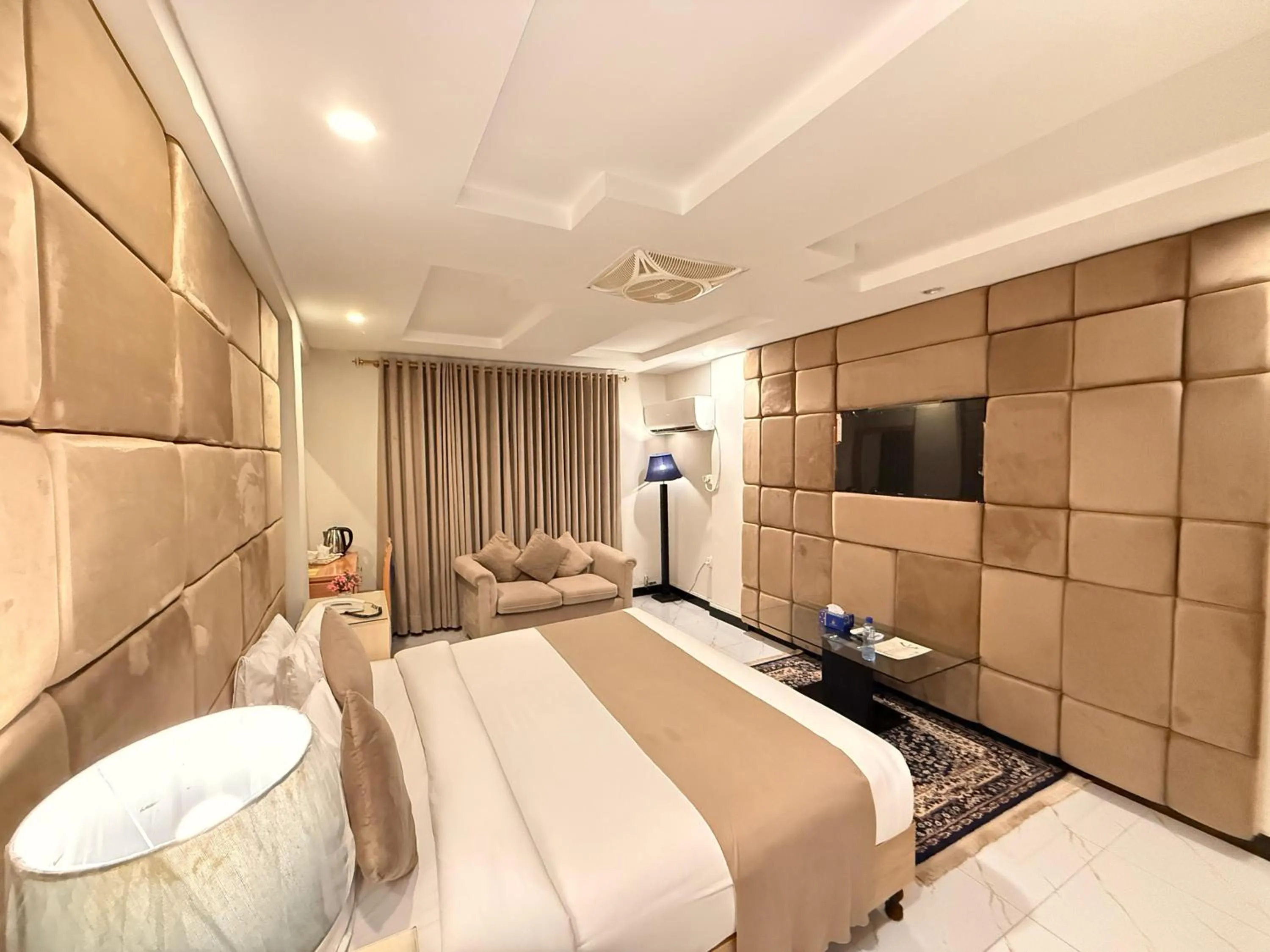 Bed in Atlas Hotel Islamabad