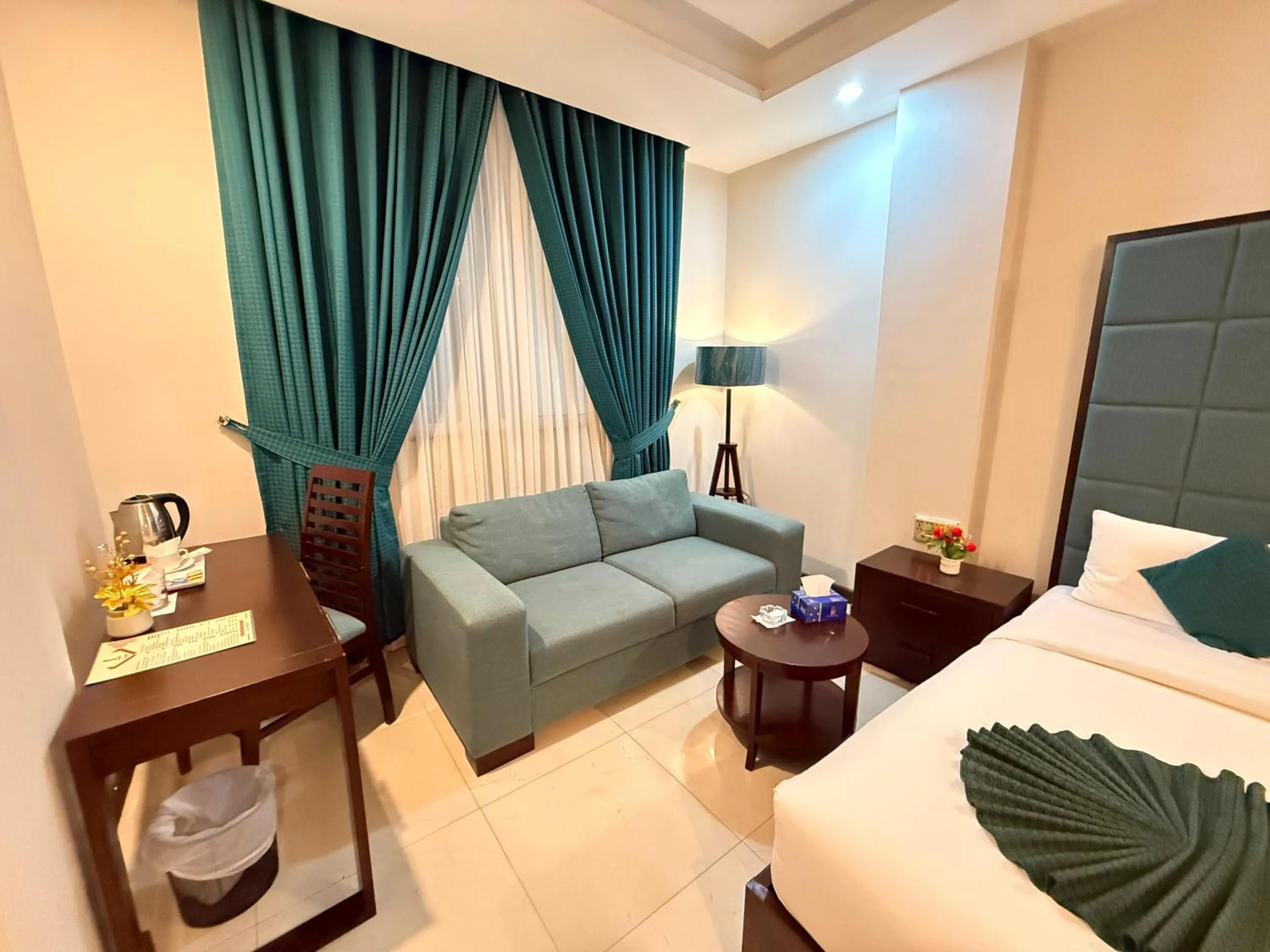 Bed in Atlas Hotel Islamabad