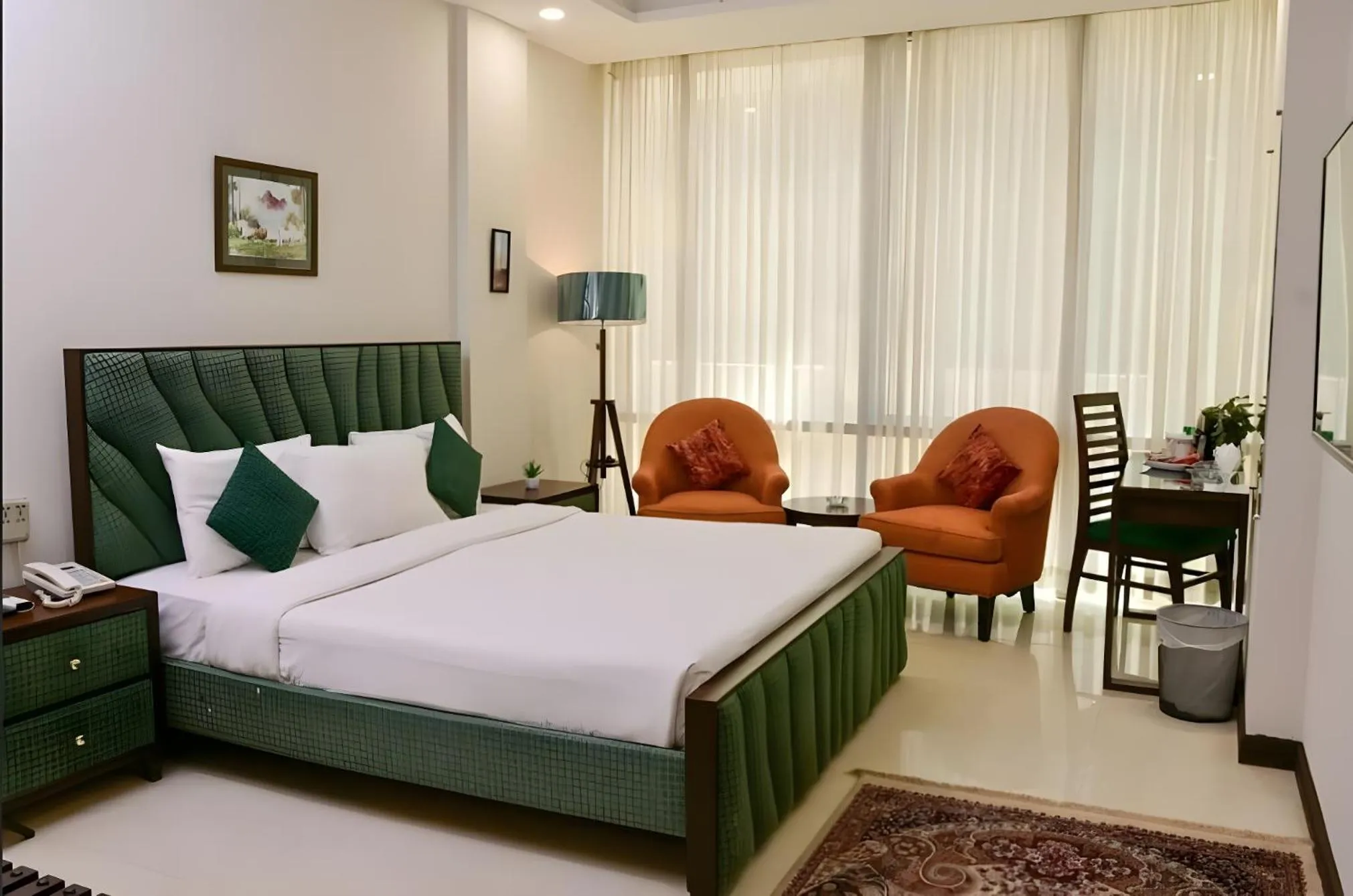 Bed in Atlas Hotel Islamabad